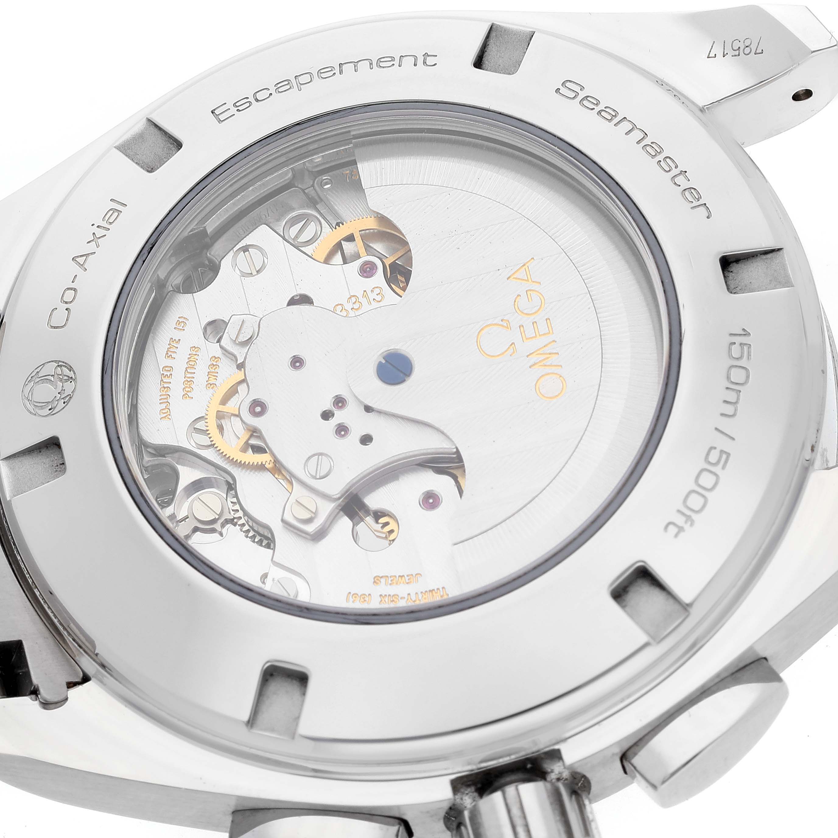 The image shows the back of the Omega Aqua Terra 231.10.44.50.04.001 Men
s Stainless Steel White Dial 231.10.44.50.04.001 Men
s Stainless Steel White Dial watch, highlighting its internal mechanical components and engravings.