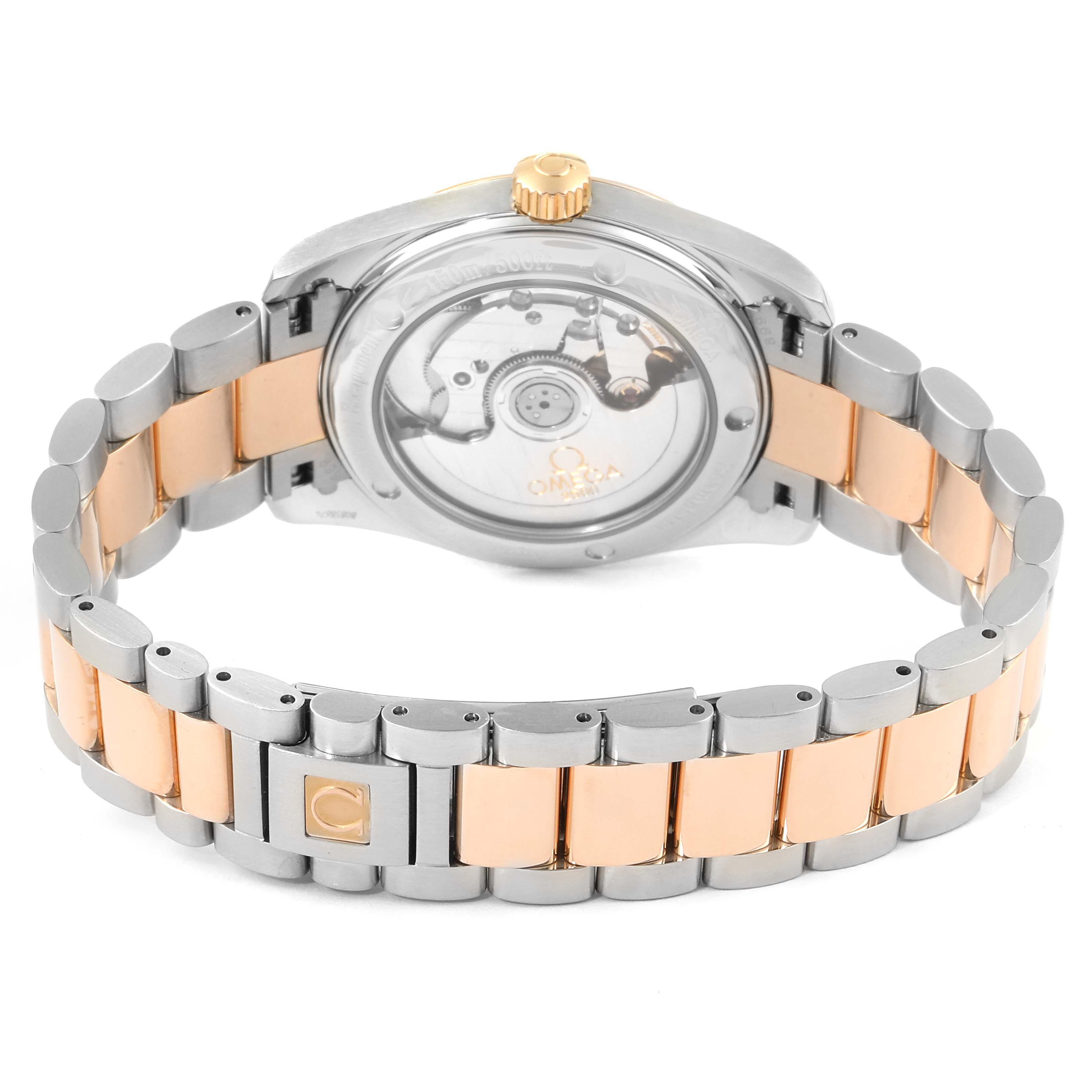 The Omega Aqua Terra 2304.30.00 Men's Steel and Gold (two tone) Silver Dial 2304.30.00 Men's Steel and Gold (two tone) Silver Dial watch is shown from the back, highlighting the case back and two-tone metal bracelet.