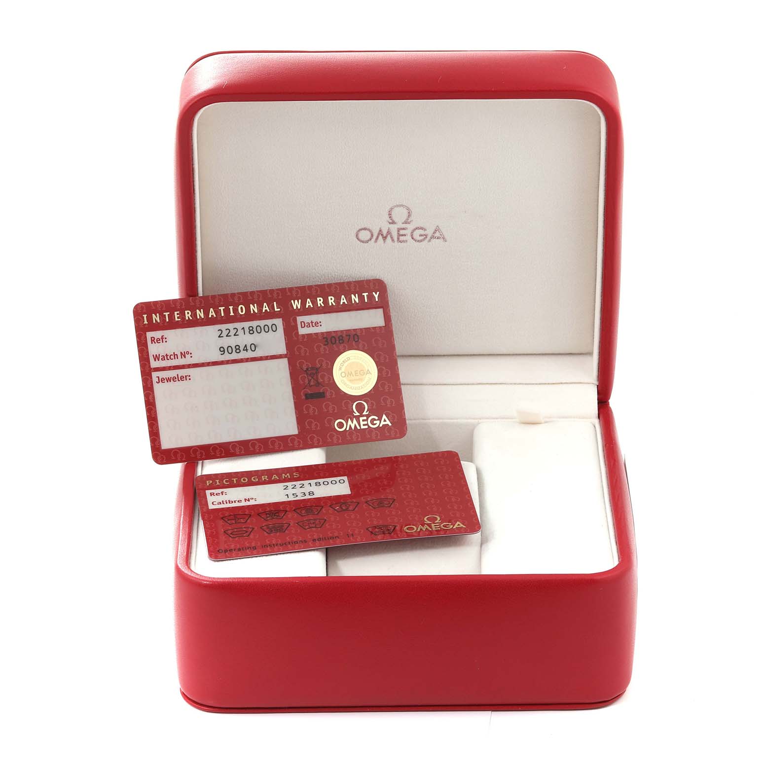 The image shows an Omega Seamaster 2221.80.00 Men
s Stainless Steel Blue Dial 2221.80.00 Men
s Stainless Steel Blue Dial watch box with an international warranty card and a pictogram card inside.