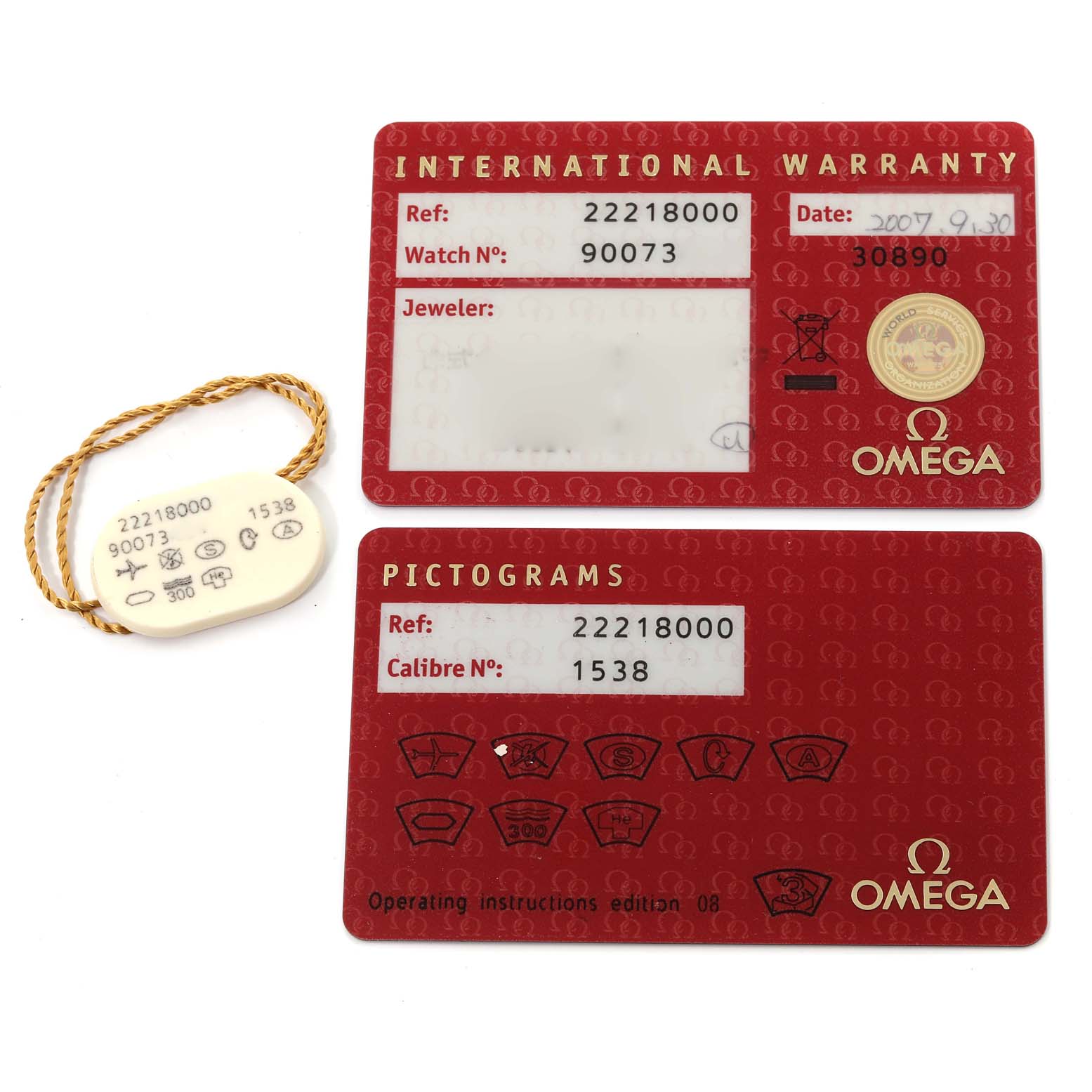 The image shows the international warranty card, pictograms card, and a tag for the Omega Seamaster 2221.80.00 Men
s Stainless Steel Blue Dial 2221.80.00 Men
s Stainless Steel Blue Dial model.