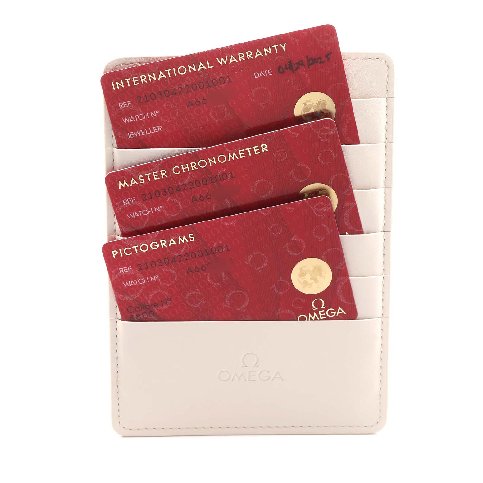 The image shows three Omega Seamaster 210.30.42.20.01.001 Men's Stainless Steel Black Dial accessory cards in a white holder, including warranty, chronometer, and pictograms cards.