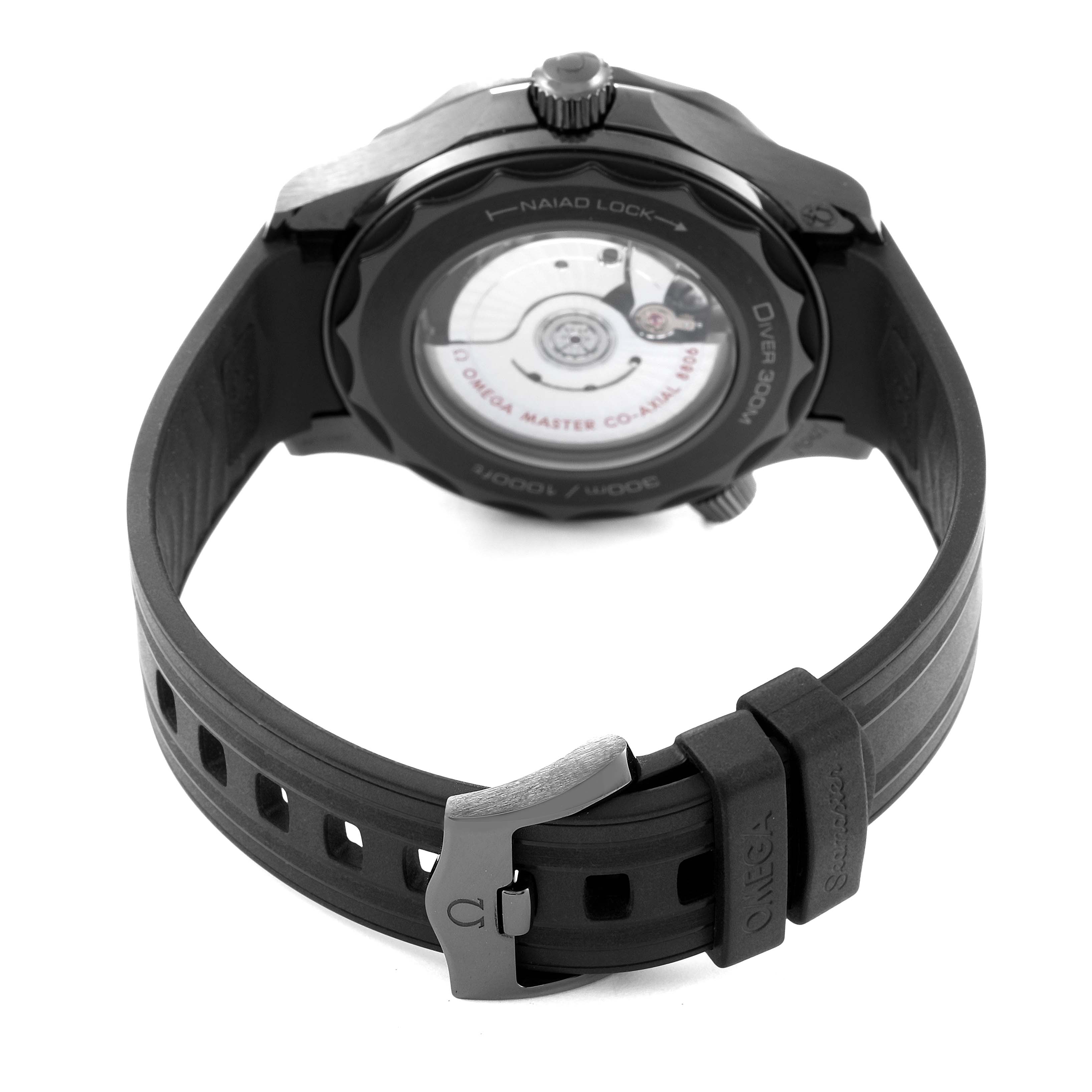 The image shows the back view of the Omega Seamaster 210.92.44.20.01.003 Men's Ceramic Black Dial 210.92.44.20.01.003 Men's Ceramic Black Dial watch, highlighting its movement and strap clasp.