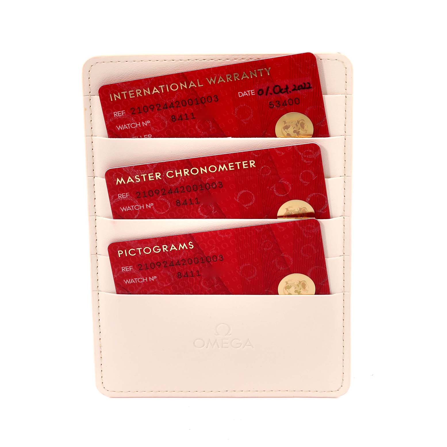 The image shows warranty cards for an Omega Seamaster 210.92.44.20.01.003 Men's Ceramic Black Dial 210.92.44.20.01.003 Men's Ceramic Black Dial watch in a cardholder.