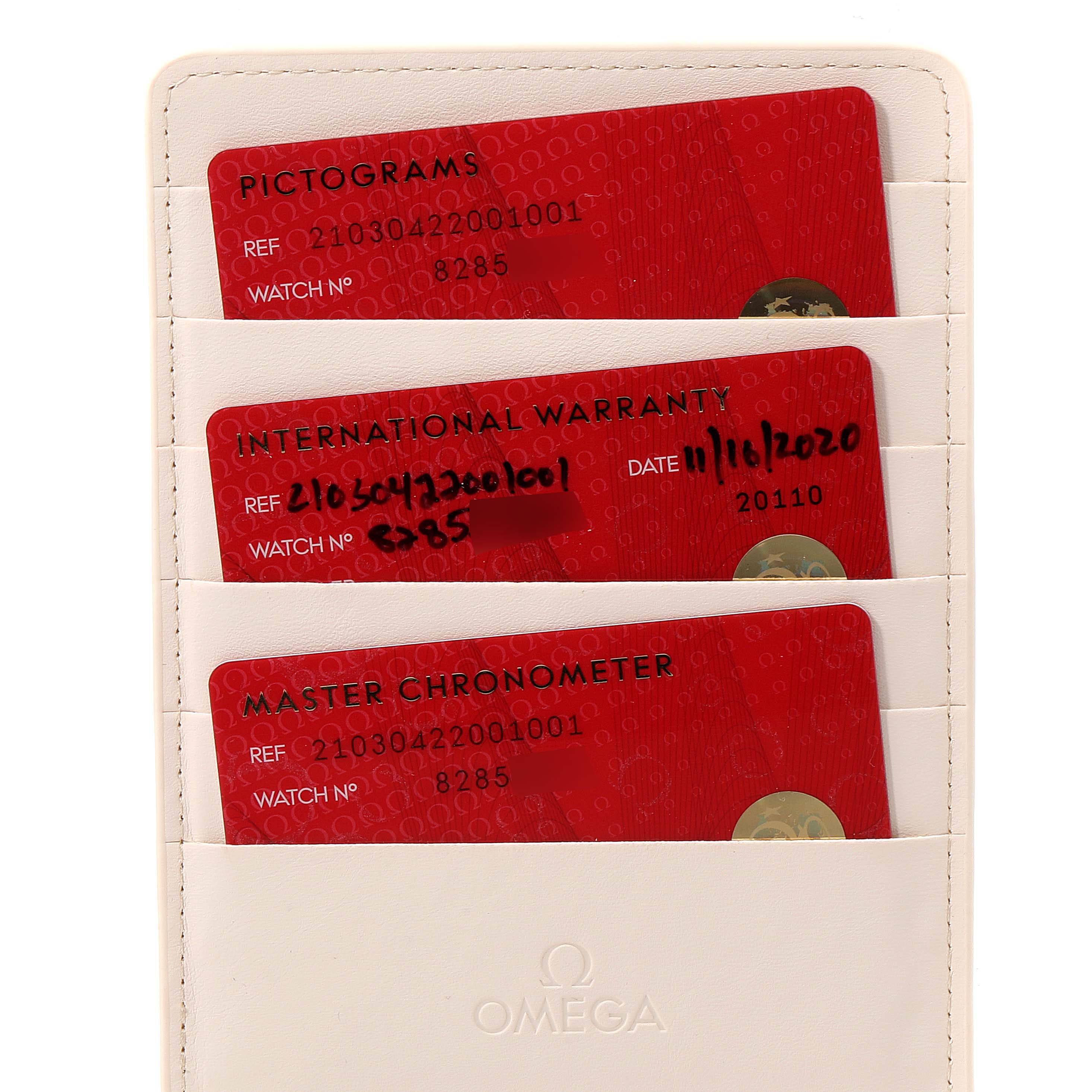 The image shows a holder containing pictogram, international warranty, and master chronometer cards for the Omega Seamaster 210.30.42.20.01.001 Men
s Stainless Steel Black Dial 210.30.42.20.01.001 Men
s Stainless Steel Black Dial model.