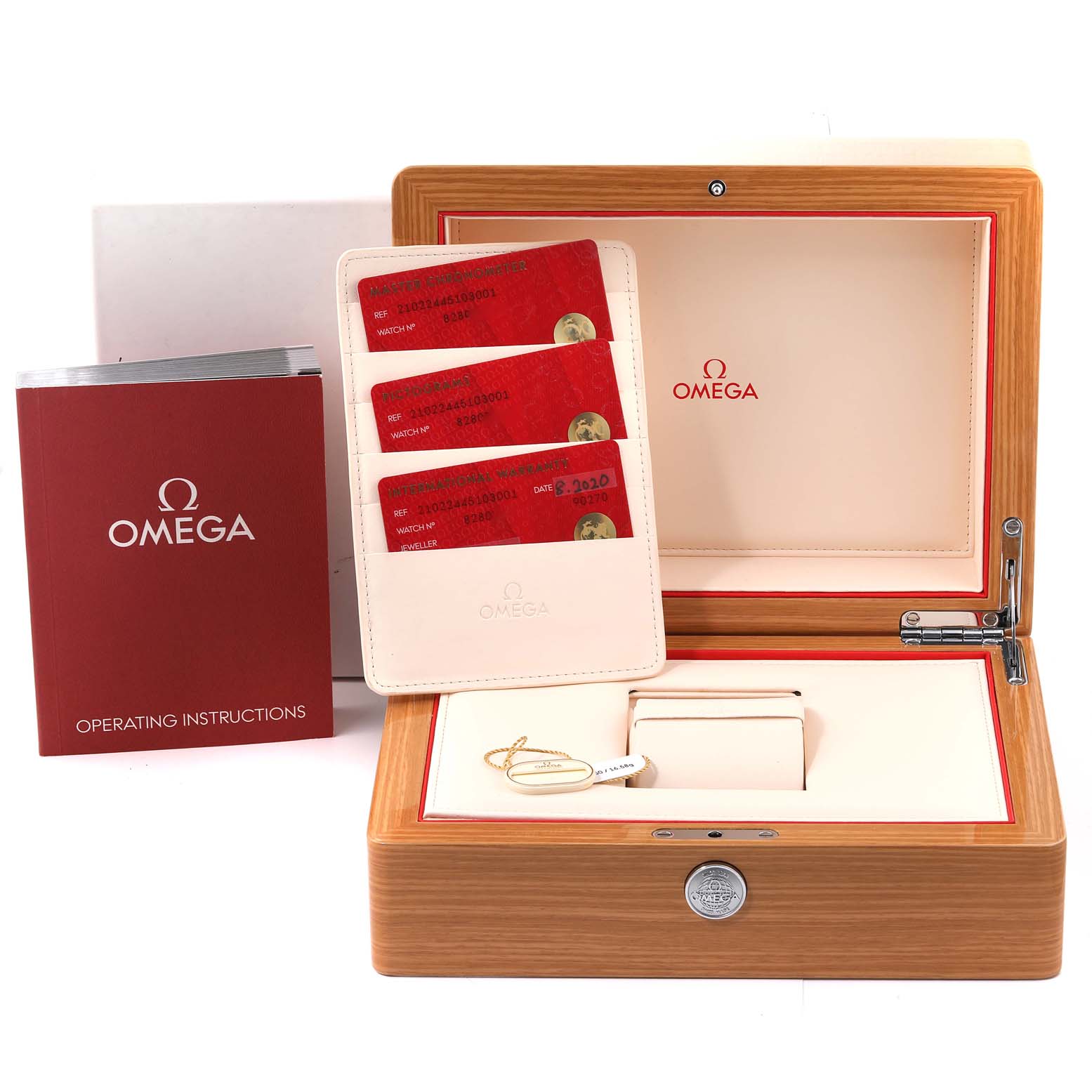 The image shows the accessories for an Omega Seamaster 210.22.44.51.03.001 Men's Steel and Gold (two tone) Blue Dial 210.22.44.51.03.001 Men's Steel and Gold (two tone) Blue Dial watch, including the box, documentation, cards, and operating instructions.