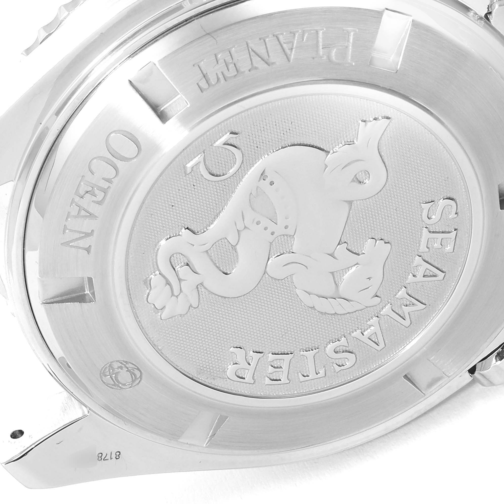 The image shows the case back of an Omega Planet Ocean 2208.50.00 Men
s Stainless Steel Black Dial 2208.50.00 Men
s Stainless Steel Black Dial watch, featuring the Seamaster logo and engraving.