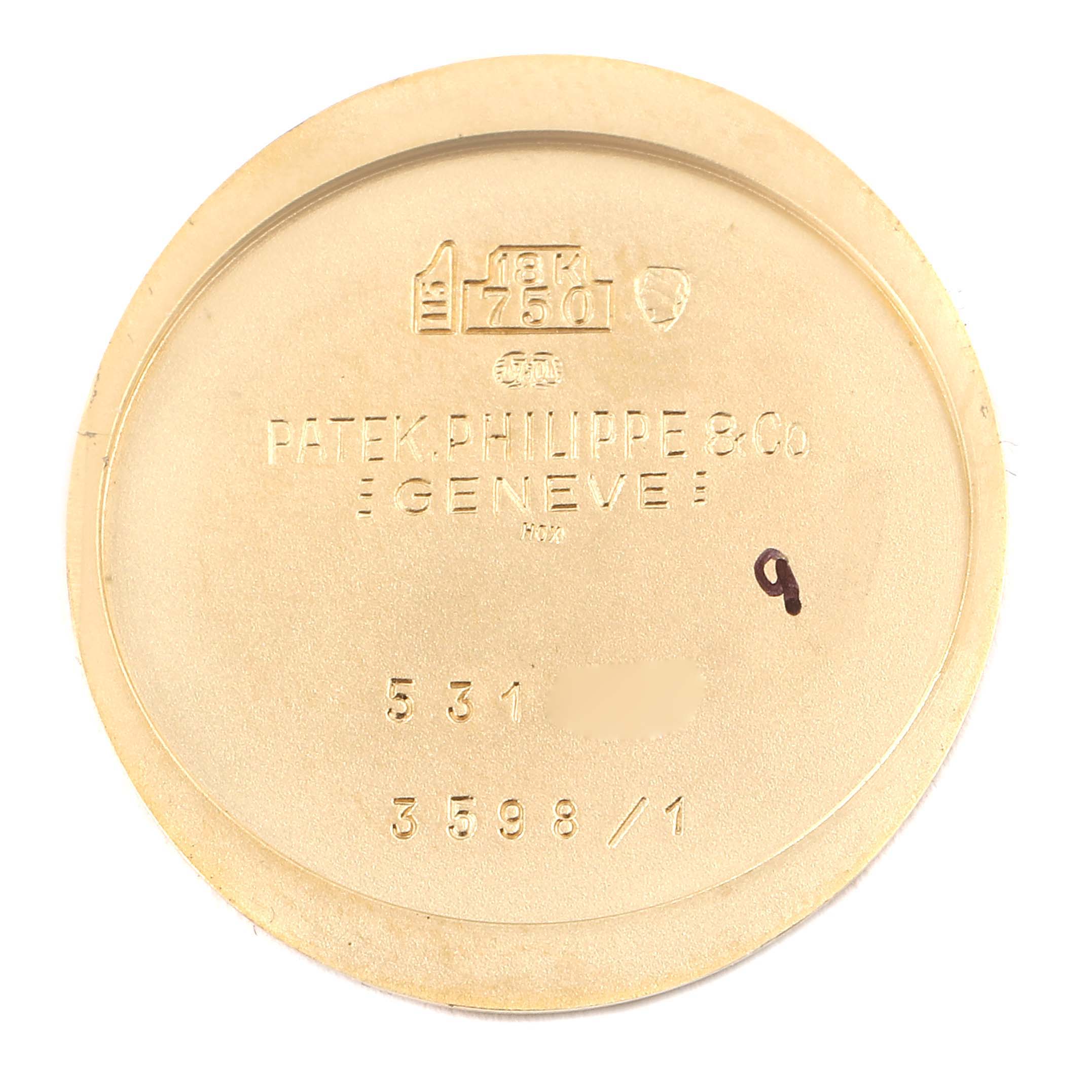 This image shows the inner case back of a Patek Philippe Golden Ellipse 3598 Men's Yellow Gold Silver Dial 3598 Men's Yellow Gold Silver Dial watch viewed from the inside.