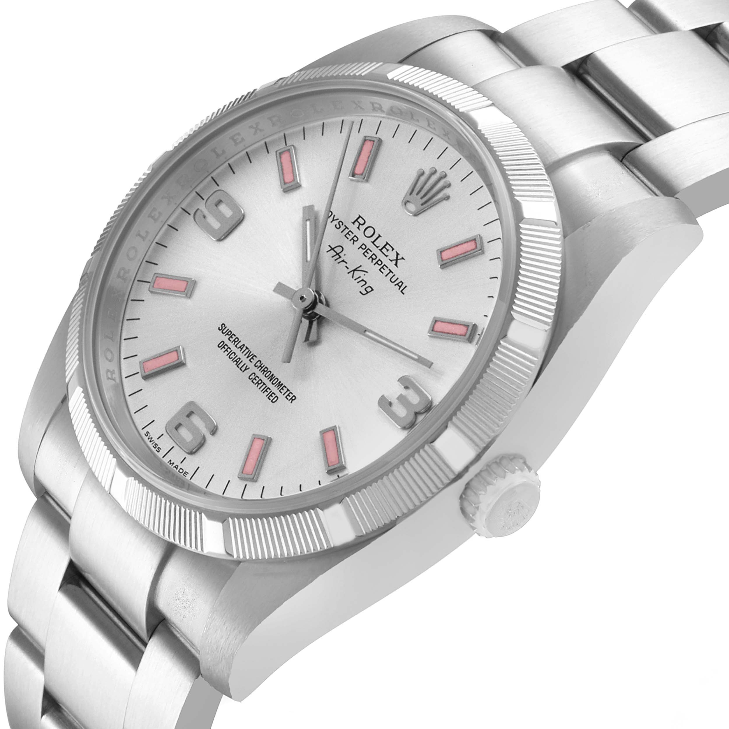 The Rolex Air-King 114210 Men's Stainless Steel Silver Dial watch is shown at a three-quarter angle, highlighting the dial, bezel, crown, and part of the bracelet.