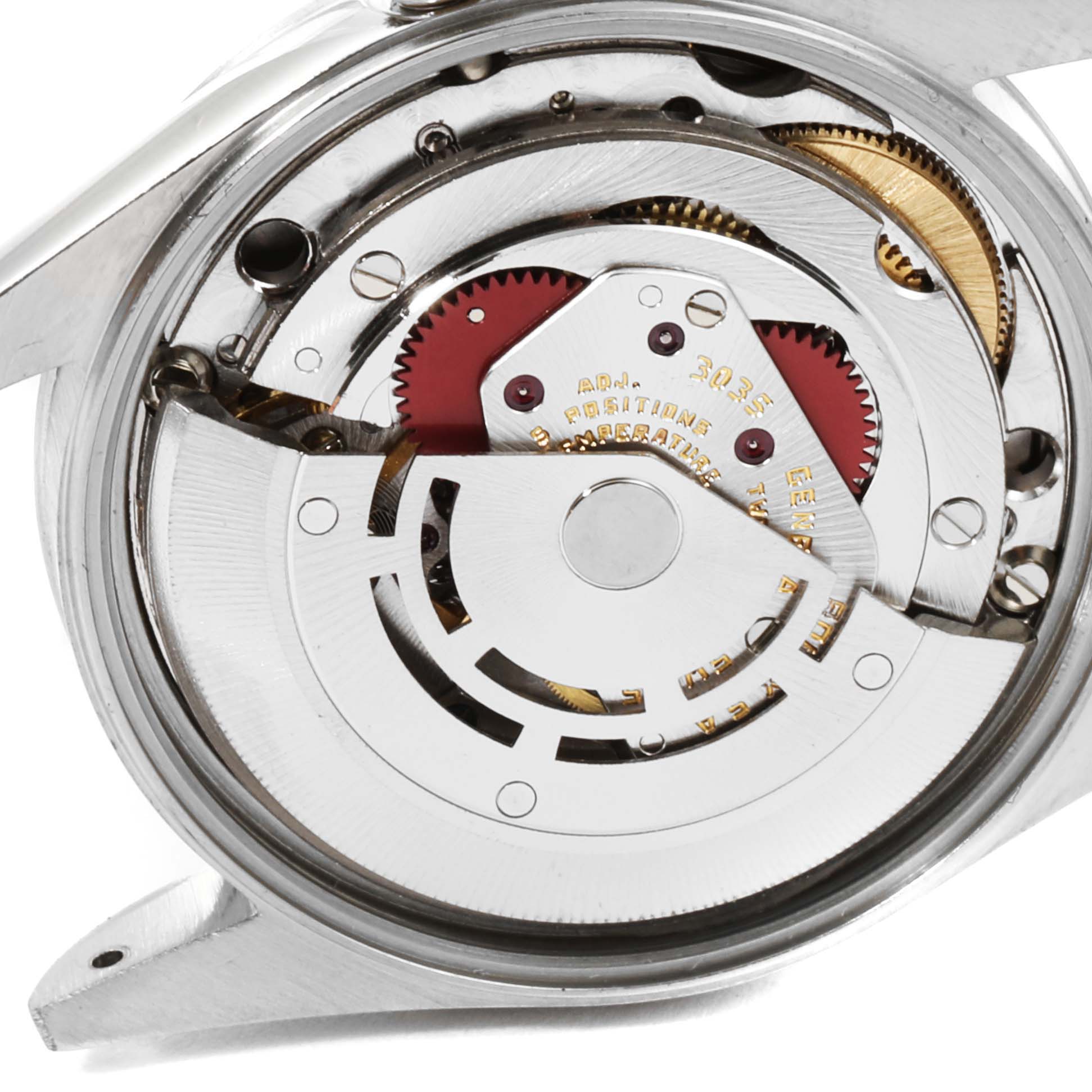 The image shows the movement mechanism of a Rolex Date 15000 Men's Stainless Steel Silver Dial 15000 Men's Stainless Steel Silver Dial model watch from the back angle.