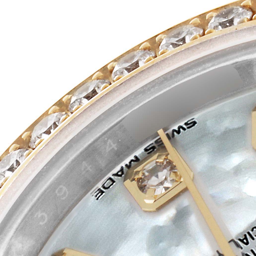 The image shows a close-up of the crystal and diamond-set bezel of a Rolex Datejust 279383 Women's Steel and Gold (two tone) Mother of Pearl Dial 279383 Women's Steel and Gold (two tone) Mother of Pearl Dial watch.
