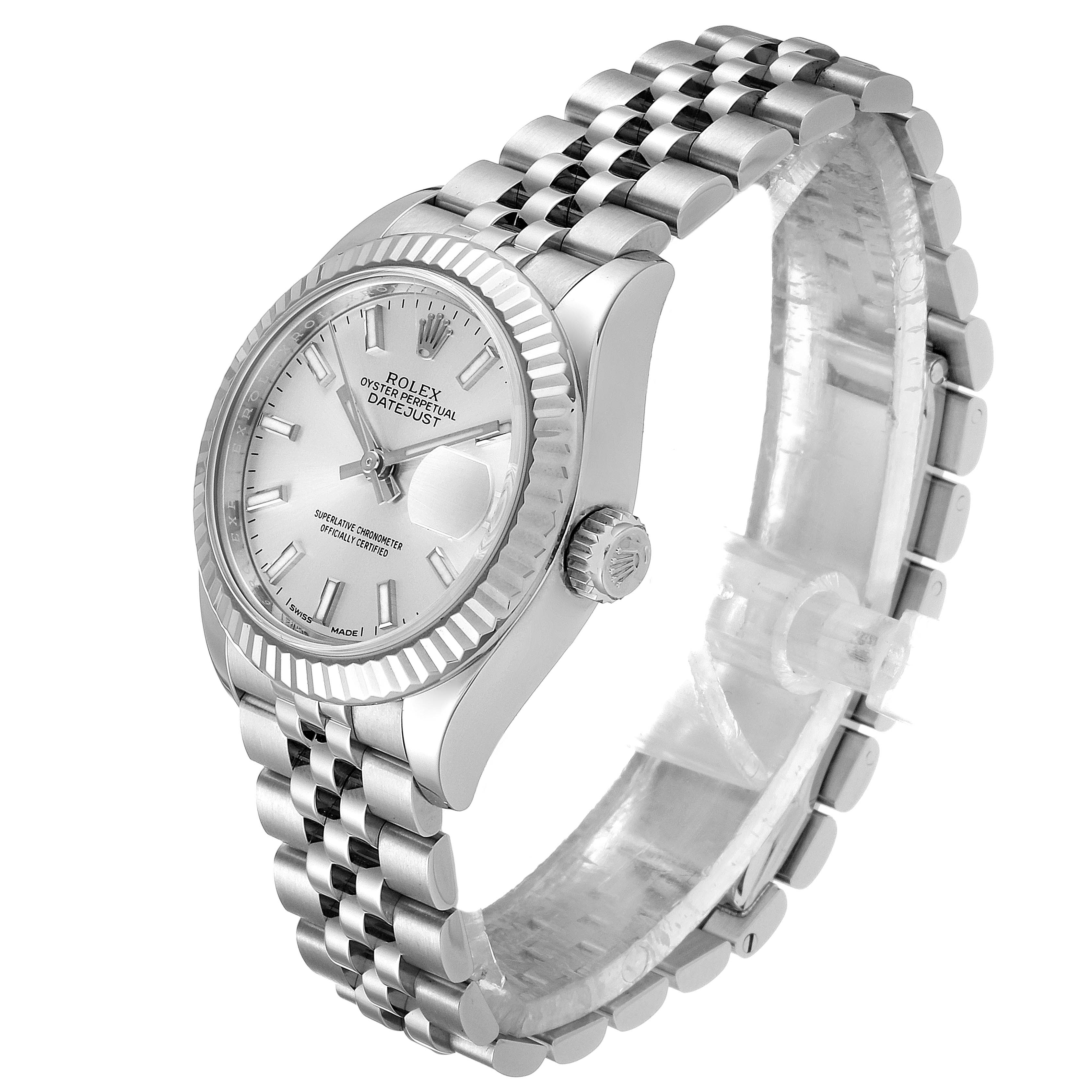 The image shows a Rolex Datejust 279174 Women
s Stainless Steel Silver Dial 279174 Women
s Stainless Steel Silver Dial watch at a three-quarter angle, highlighting the face, fluted bezel, and Jubilee bracelet.