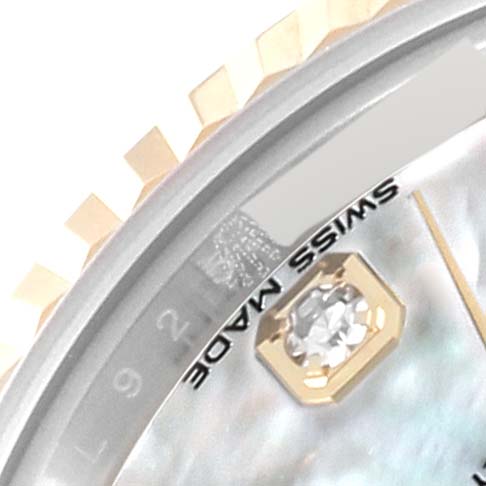 The image shows a close-up angle of the Rolex Datejust 279173 Women's Steel and Gold (two tone) Mother of Pearl Dial 279173 Women's Steel and Gold (two tone) Mother of Pearl Dial watch, highlighting the "SWISS MADE" text, diamond marker, and part of the bezel.