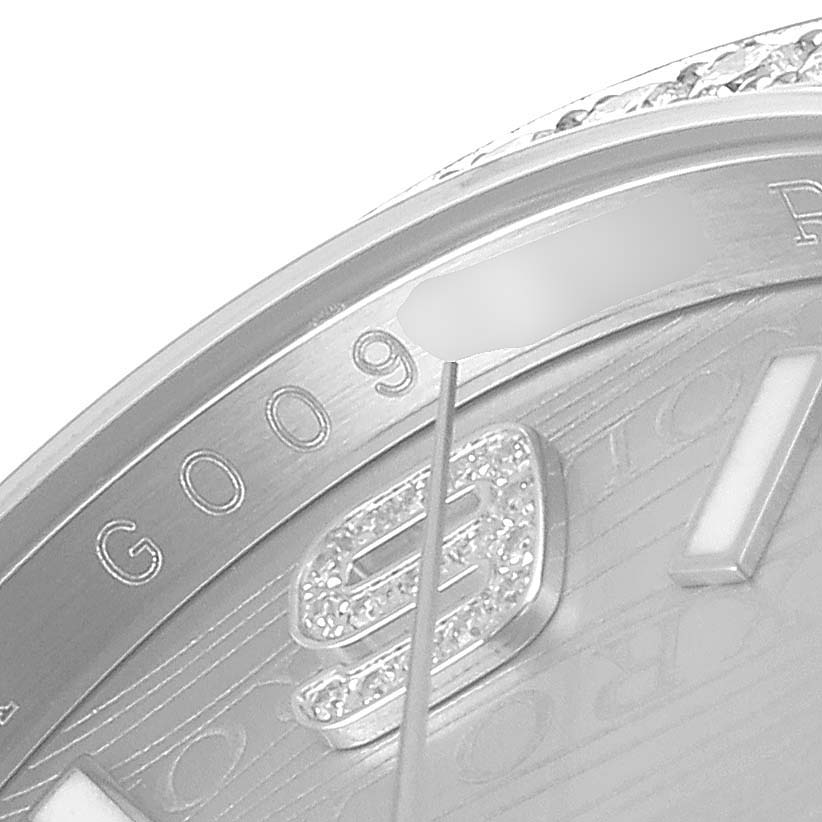The image shows a close-up of the dial and a portion of the bezel of a Rolex Datejust 116244 Men's Stainless Steel Silver Dial 116244 Men's Stainless Steel Silver Dial watch.