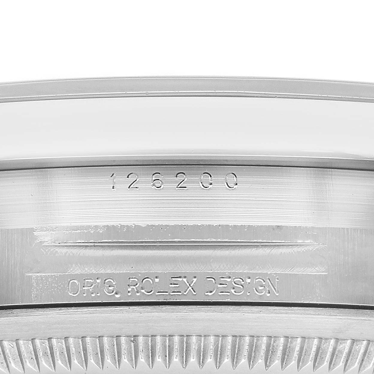 The image shows a close-up of the case side of a Rolex Datejust 126200 Men's Stainless Steel Blue Dial, displaying the model number and "ORIG. ROLEX DESIGN" engraving.