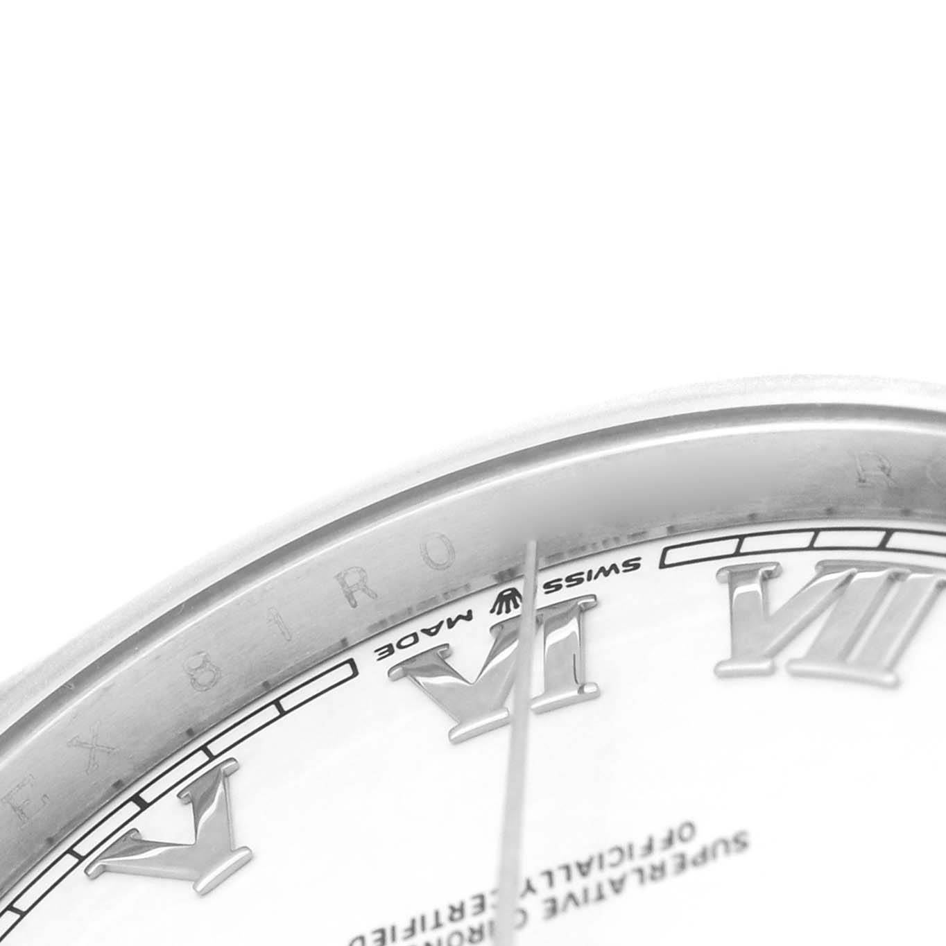 The image shows a close-up of the dial edge and Roman numerals of a Rolex Datejust 41 126300 Men's Stainless Steel White Dial watch, focused on details near the 6-7 o'clock position.