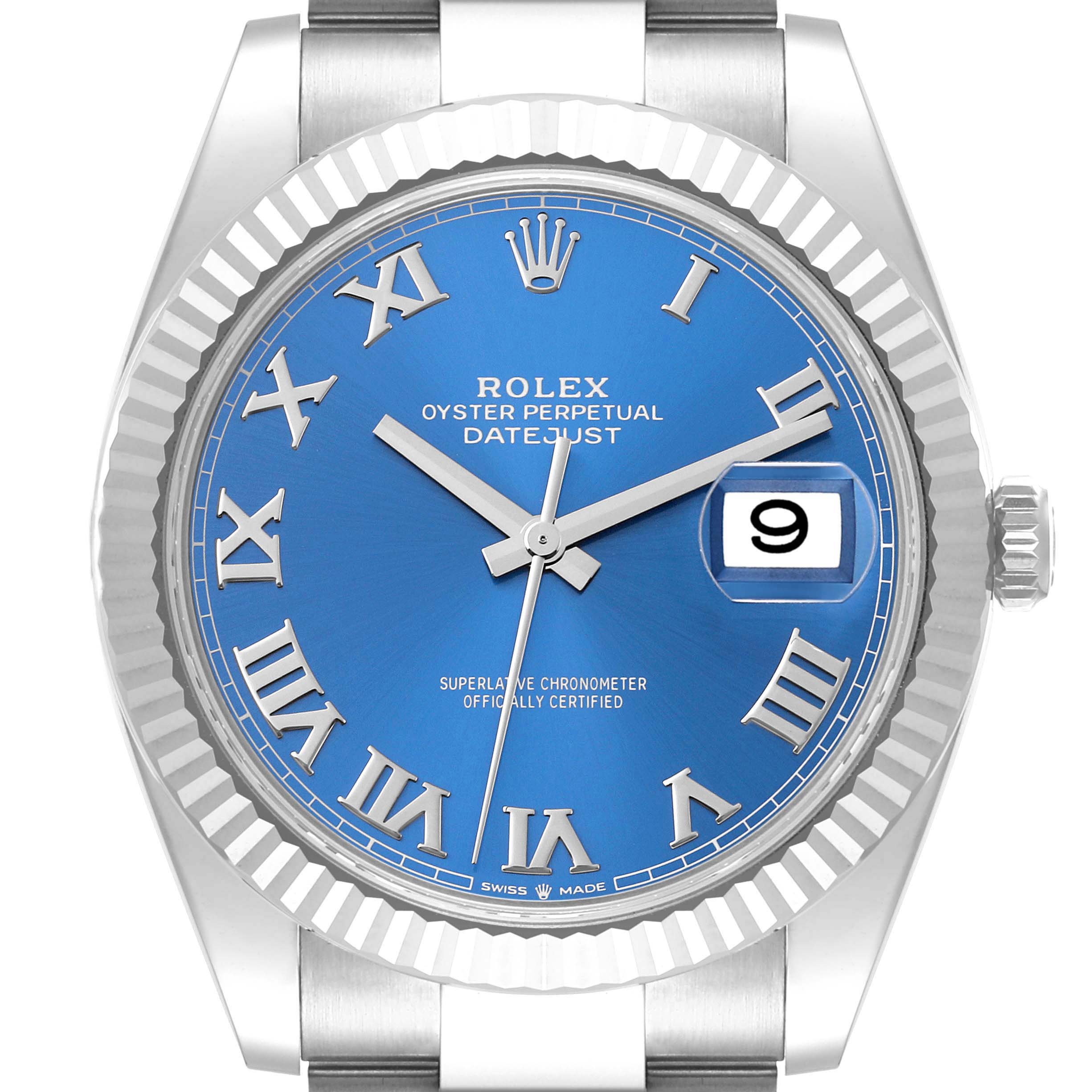 The image shows a close-up front view of a Rolex Datejust 41 126334 Men
s Stainless Steel Blue Dial 126334 Men
s Stainless Steel Blue Dial watch, displaying its blue dial, Roman numerals, fluted bezel, and date window.