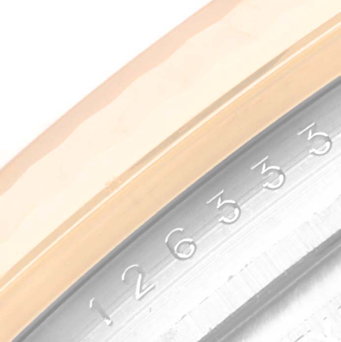 This image shows a close-up of the bezel and part of the dial with date markings of the Rolex Datejust 41 126333 Men's Steel and Gold (two tone) Champagne Dial 126333 Men's Steel and Gold (two tone) Champagne Dial watch.