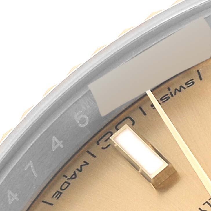 The image shows a close-up of the dial, bezel, and part of the date window of the Rolex Datejust 41 126333 Men's Steel and Gold (two tone) Champagne Dial 126333 Men's Steel and Gold (two tone) Champagne Dial watch.