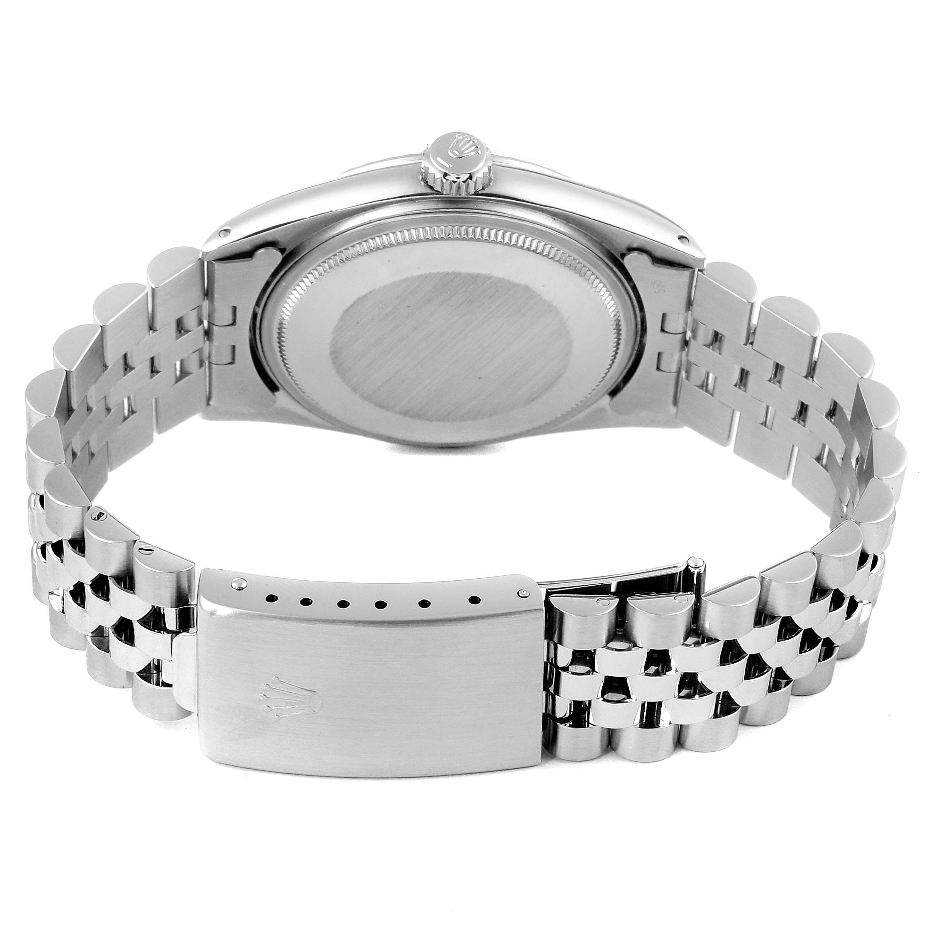 The image shows the back view of the case and the bracelet clasp of a Rolex Vintage Collection 1603 Men
s Stainless Steel Silver Dial 1603 Men
s Stainless Steel Silver Dial watch.