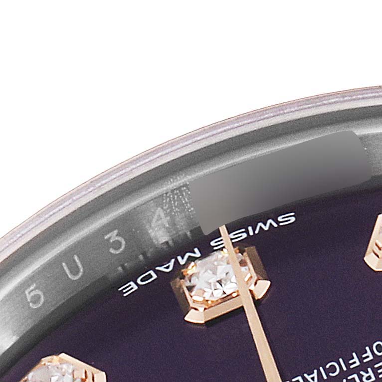This image shows a close-up of the dial and bezel of a Rolex Datejust 279171 Women's Steel and Gold (two tone) Blue Dial 279171 Women's Steel and Gold (two tone) Blue Dial watch, highlighting the minute markers and a diamond hour marker.