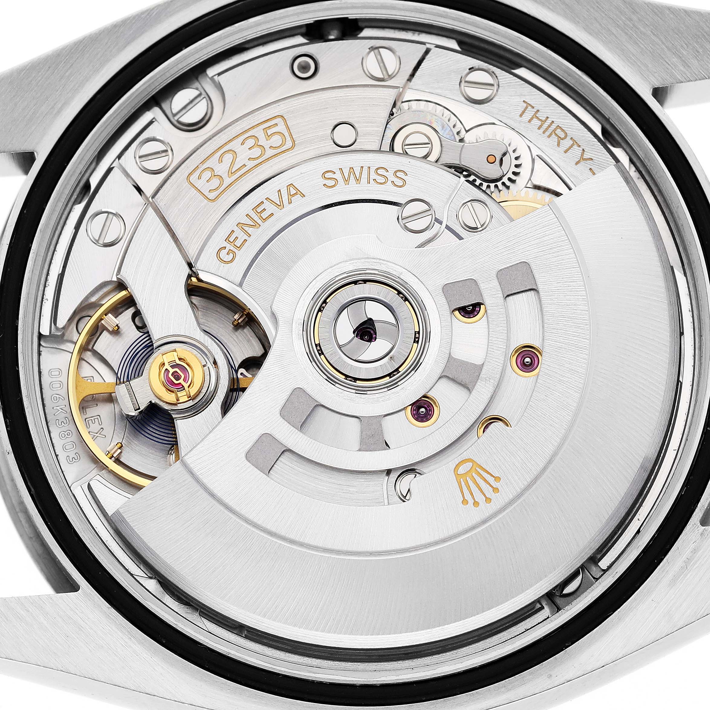 This image shows the back view of a Rolex Datejust 126234 Men's Stainless Steel Purple Dial 126234 Men's Stainless Steel Purple Dial, displaying its intricate mechanical movement and parts.