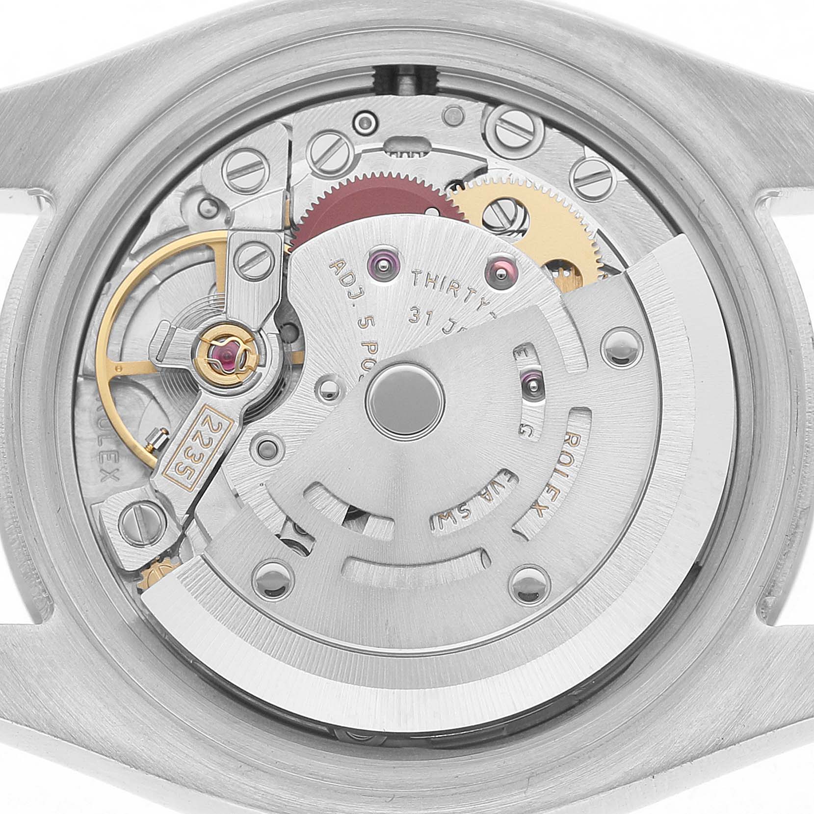 This image shows the movement of a Rolex Datejust 179174 Women's Stainless Steel Silver Dial watch, viewed from the back case, highlighting its intricate components.