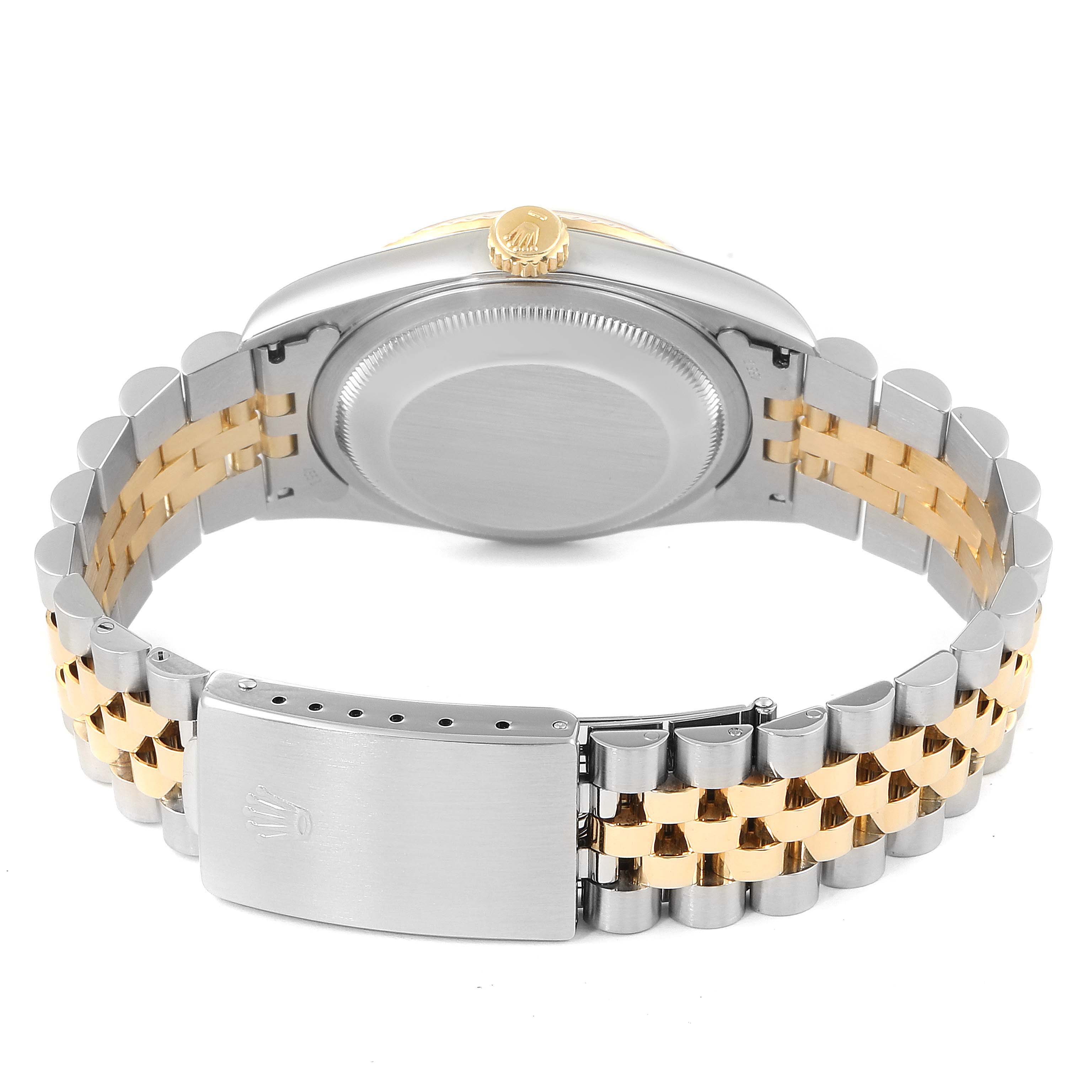 The image shows the back case, crown, and bi-metal bracelet of a Rolex Datejust 16233 Men
s Steel and Gold (two tone) Mother of Pearl Dial 16233 Men
s Steel and Gold (two tone) Mother of Pearl Dial watch.
