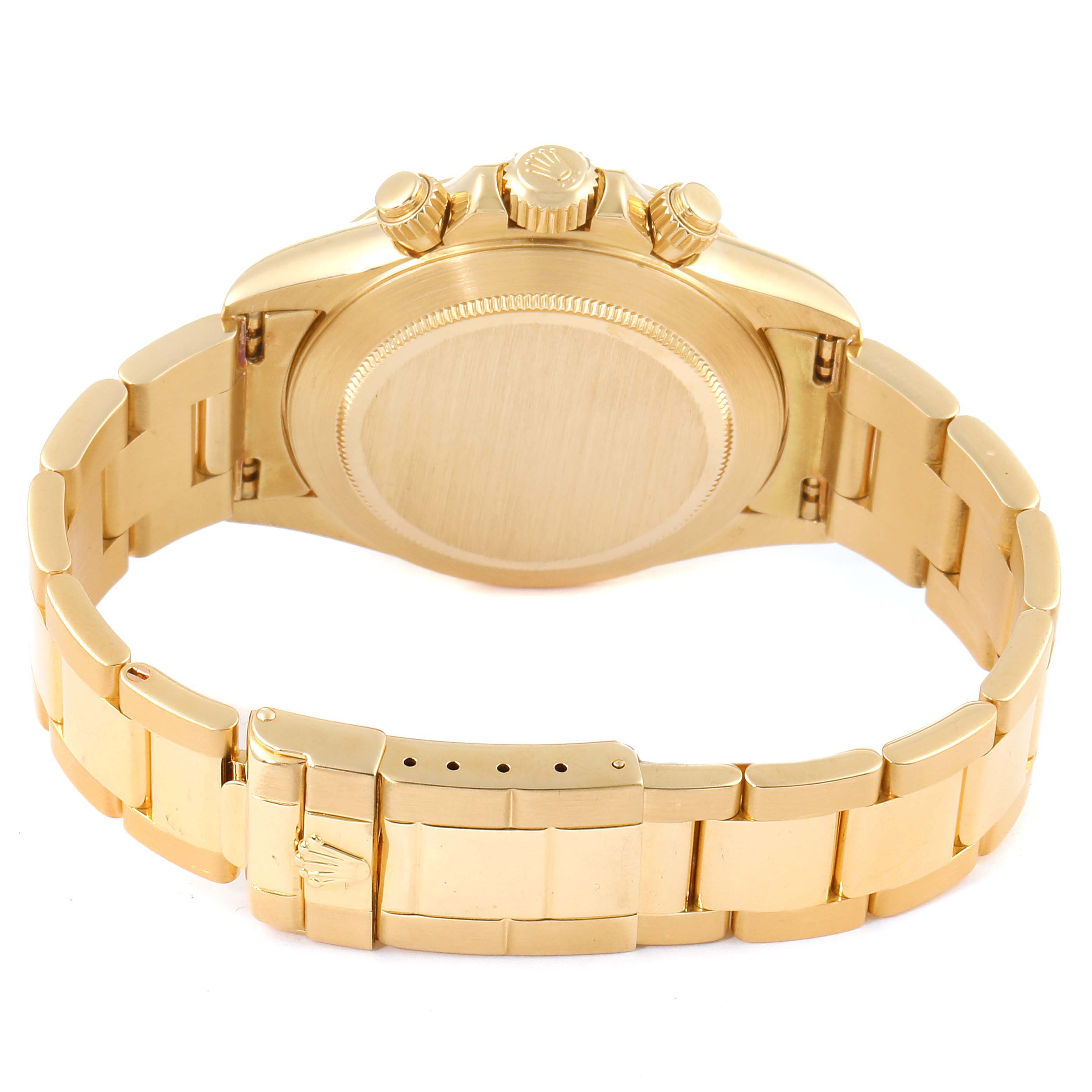 This image shows the back view of a Rolex Daytona 16528 Men's Yellow Gold Black Dial 16528 Men's Yellow Gold Black Dial watch, highlighting its case, crown, pushers, and bracelet.