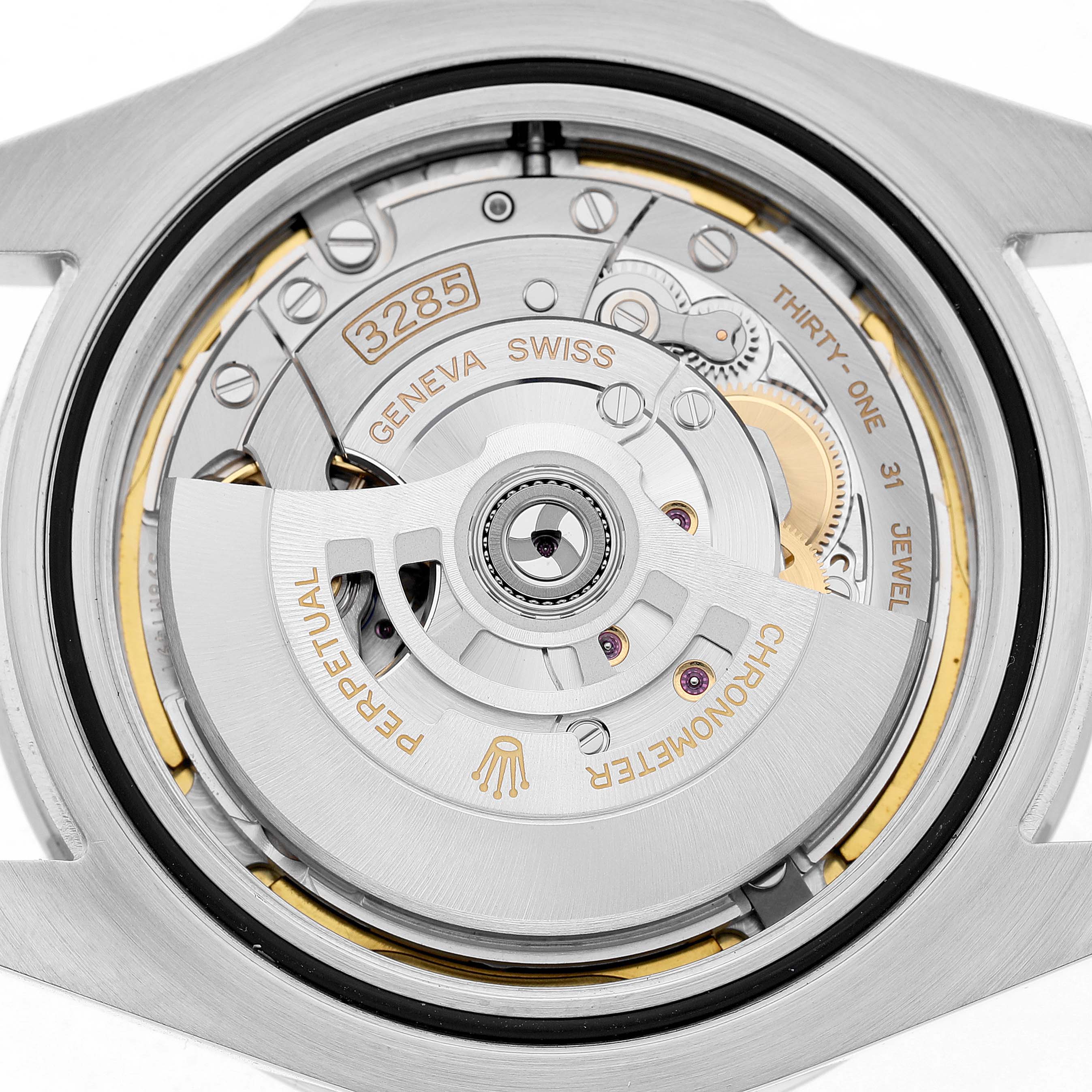 This is a close-up view of the Rolex Explorer 226570 Men's Stainless Steel Black Dial's movement, showing the rotor and internal mechanics.