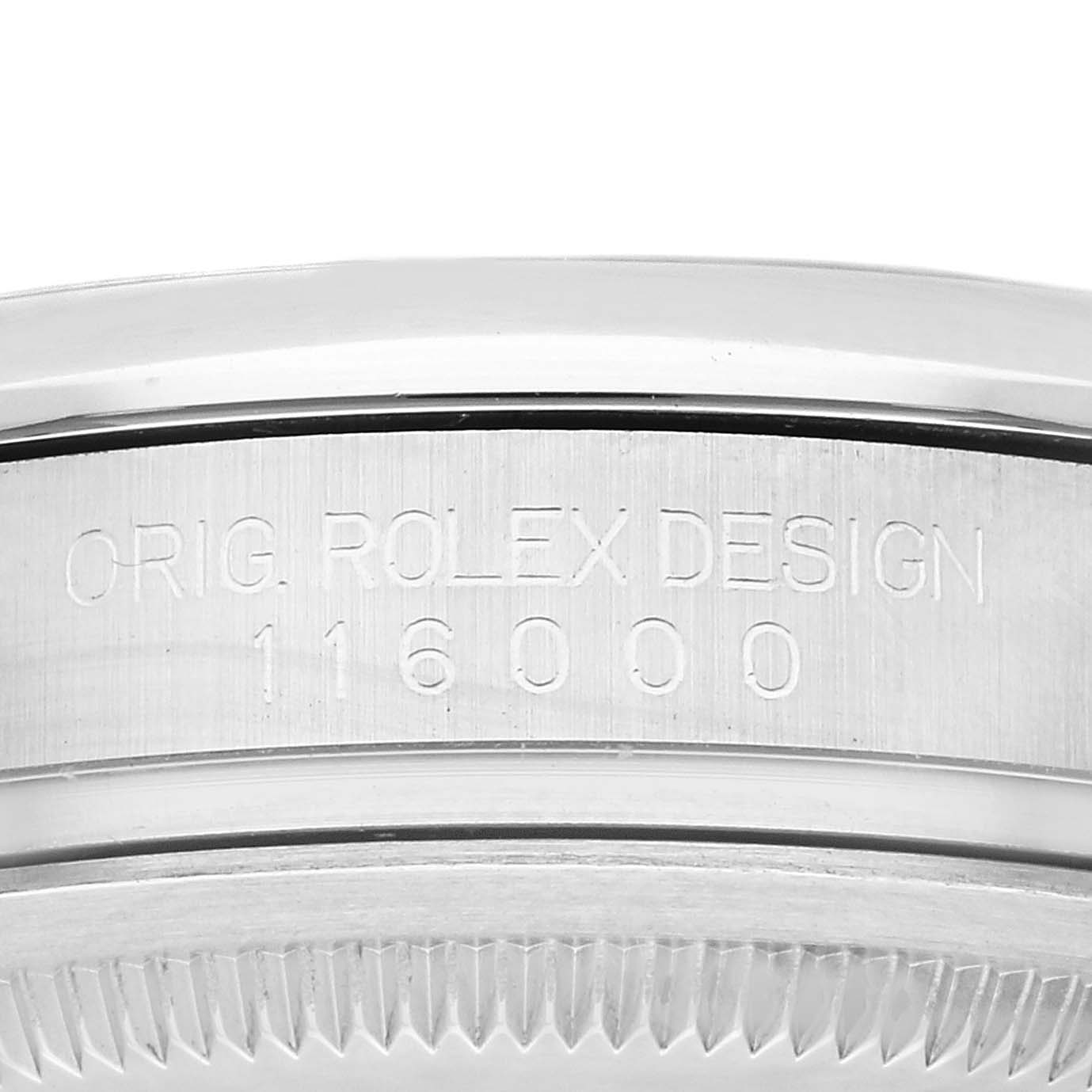 The image shows a close-up of the side of a Rolex Oyster Perpetual 116000 Men
s Stainless Steel Blue Dial 116000 Men
s Stainless Steel Blue Dial watch case, detailing its model number 116000.