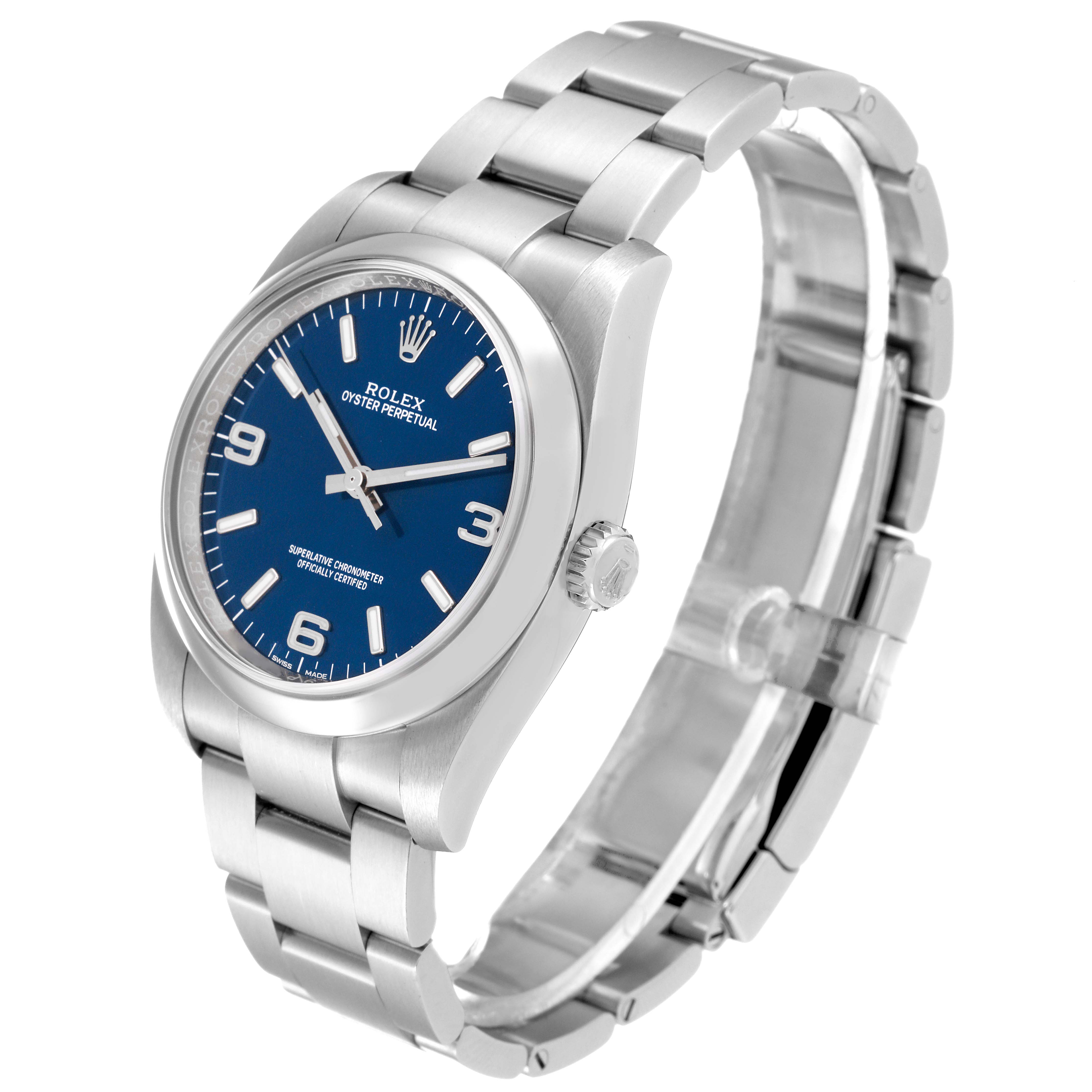 The Rolex Oyster Perpetual 116000 Men
s Stainless Steel Blue Dial 116000 Men
s Stainless Steel Blue Dial watch is shown from a three-quarter angle, highlighting its blue dial, bracelet, and clasp.