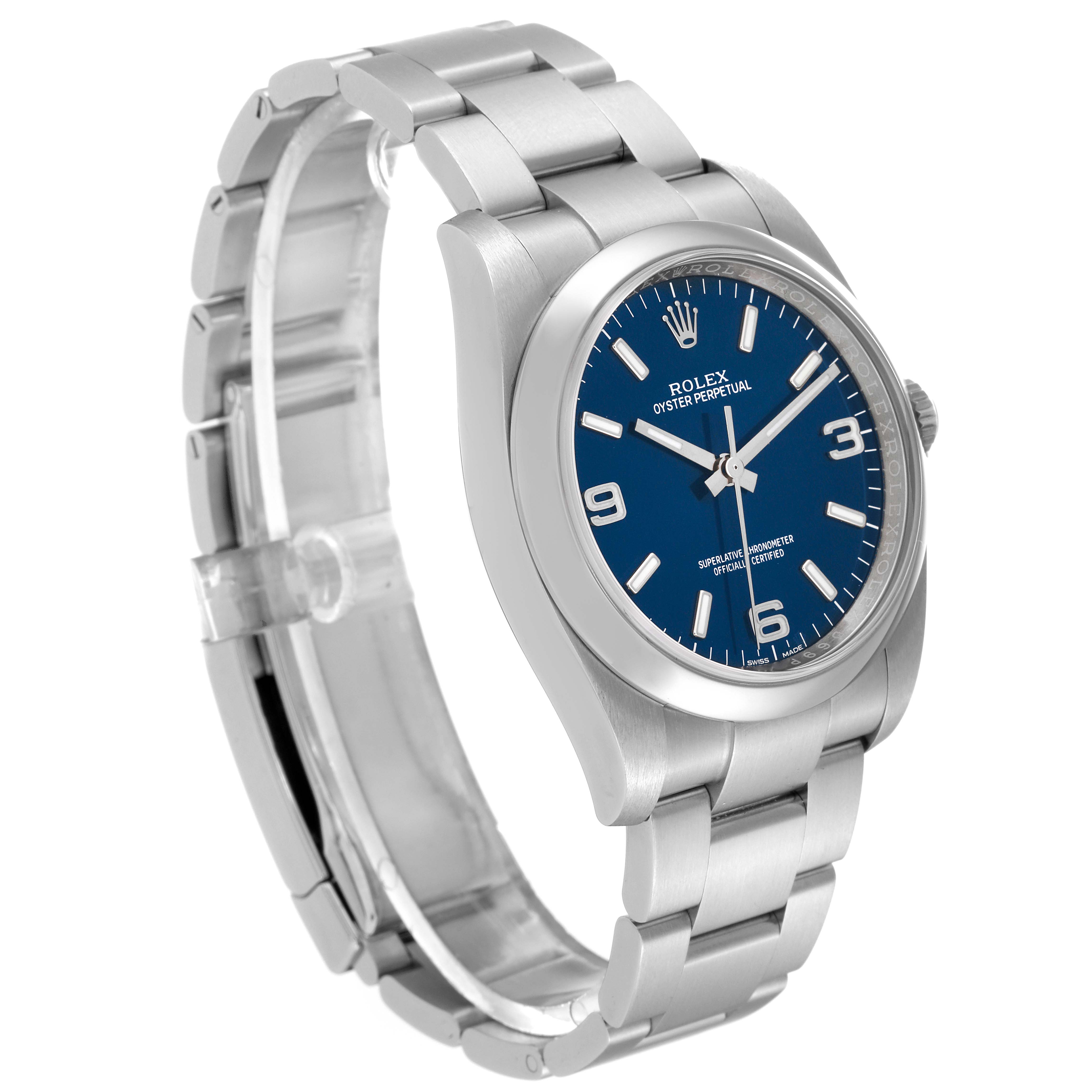 The image shows a Rolex Oyster Perpetual 116000 Men
s Stainless Steel Blue Dial 116000 Men
s Stainless Steel Blue Dial watch at a three-quarter angle, highlighting the bracelet and blue dial.