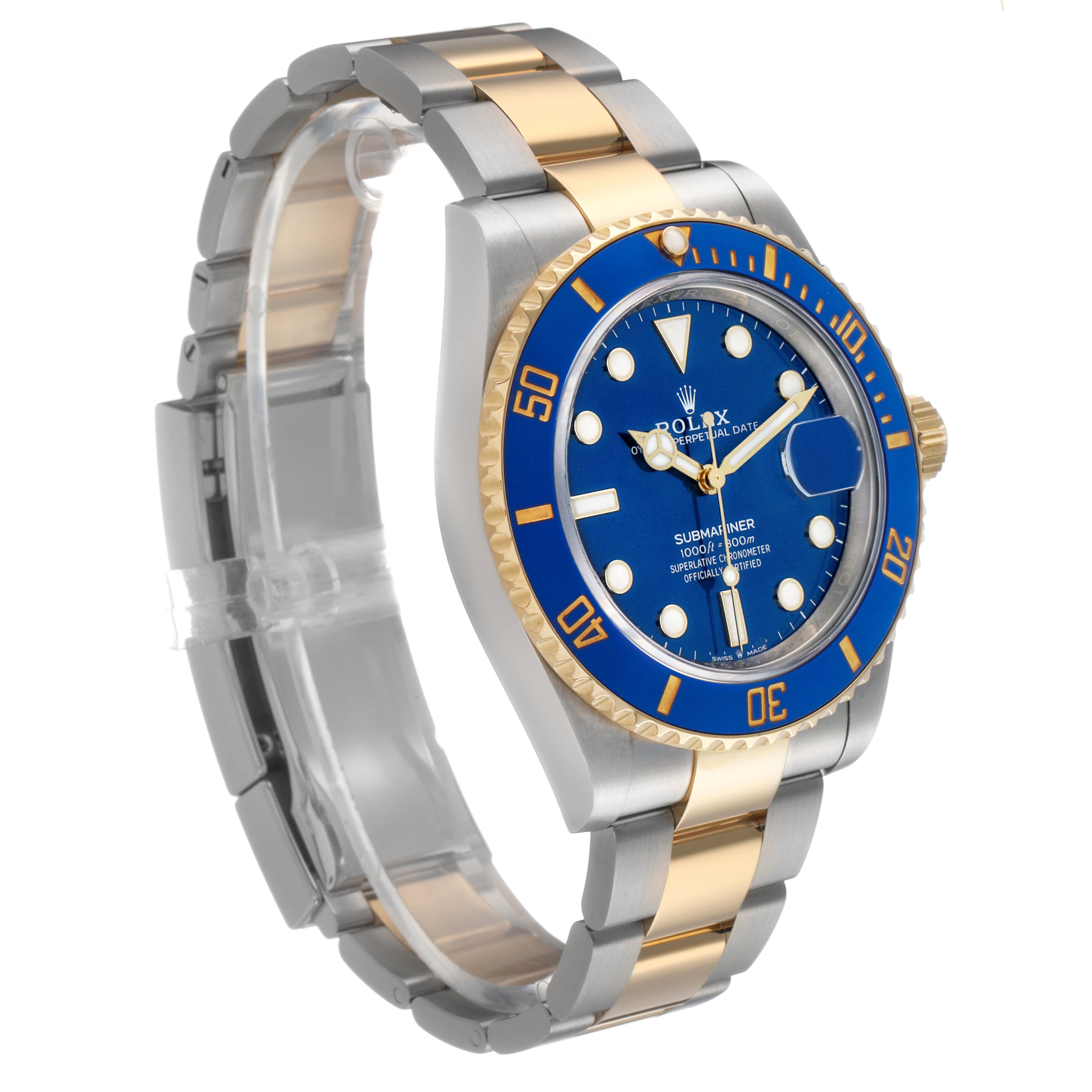 The Rolex Submariner 126613 Men's Steel and Gold (two tone) Blue Dial is shown in a three-quarter view, highlighting the blue dial, bezel, and two-tone bracelet.