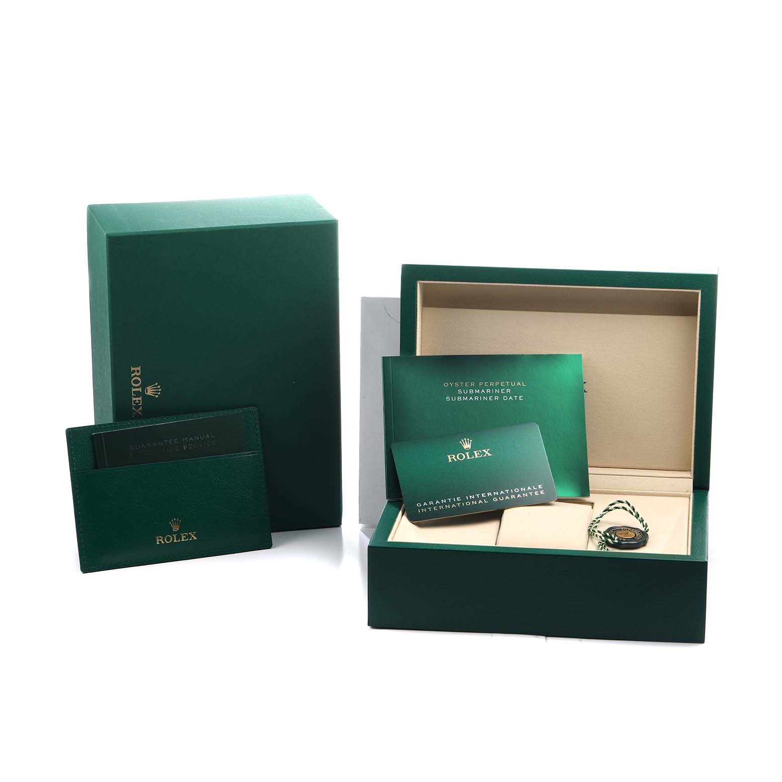 The image shows the packaging and documentation for the Rolex Submariner 126613 Men's Steel and Gold (two tone) Blue Dial, including boxes and manuals, at an angled view.