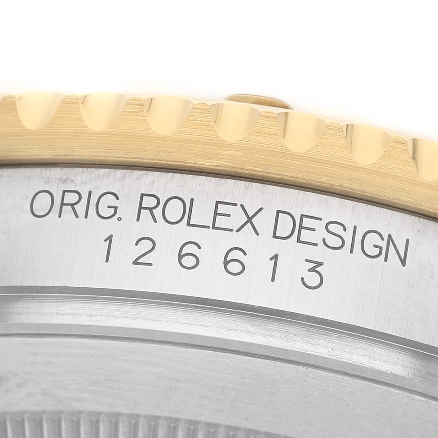 The image shows a close-up of the side of a Rolex Submariner 126613 Men's Steel and Gold (two tone) Blue Dial, highlighting the model number and part of the gold bezel.
