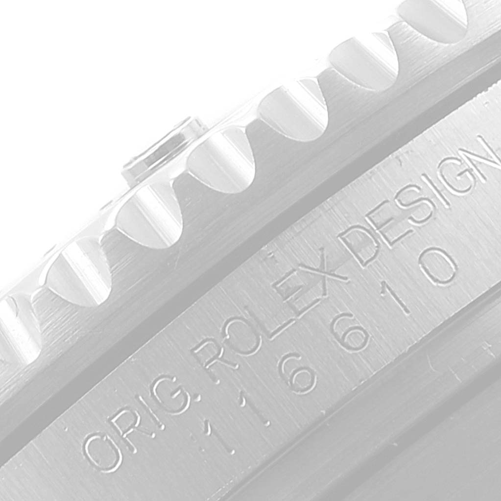 The image shows a close-up side view of the bezel and engraving on a Rolex Submariner 116610LV Men
s Stainless Steel Green Dial 116610LV Men
s Stainless Steel Green Dial.
