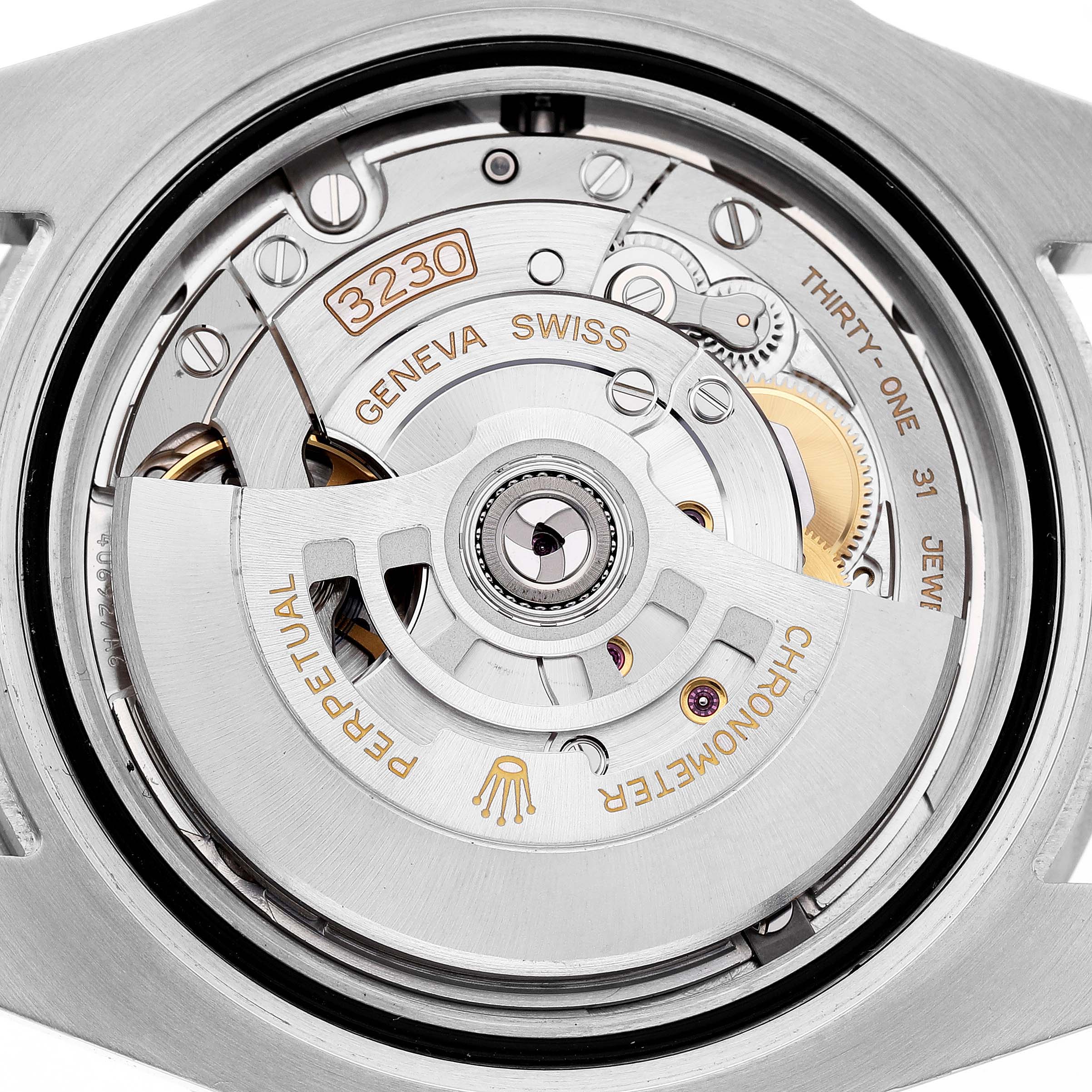 The image shows the movement of a Rolex Submariner 124060 Men's Stainless Steel Black Dial, highlighting its intricate inner mechanisms and components like the rotor.