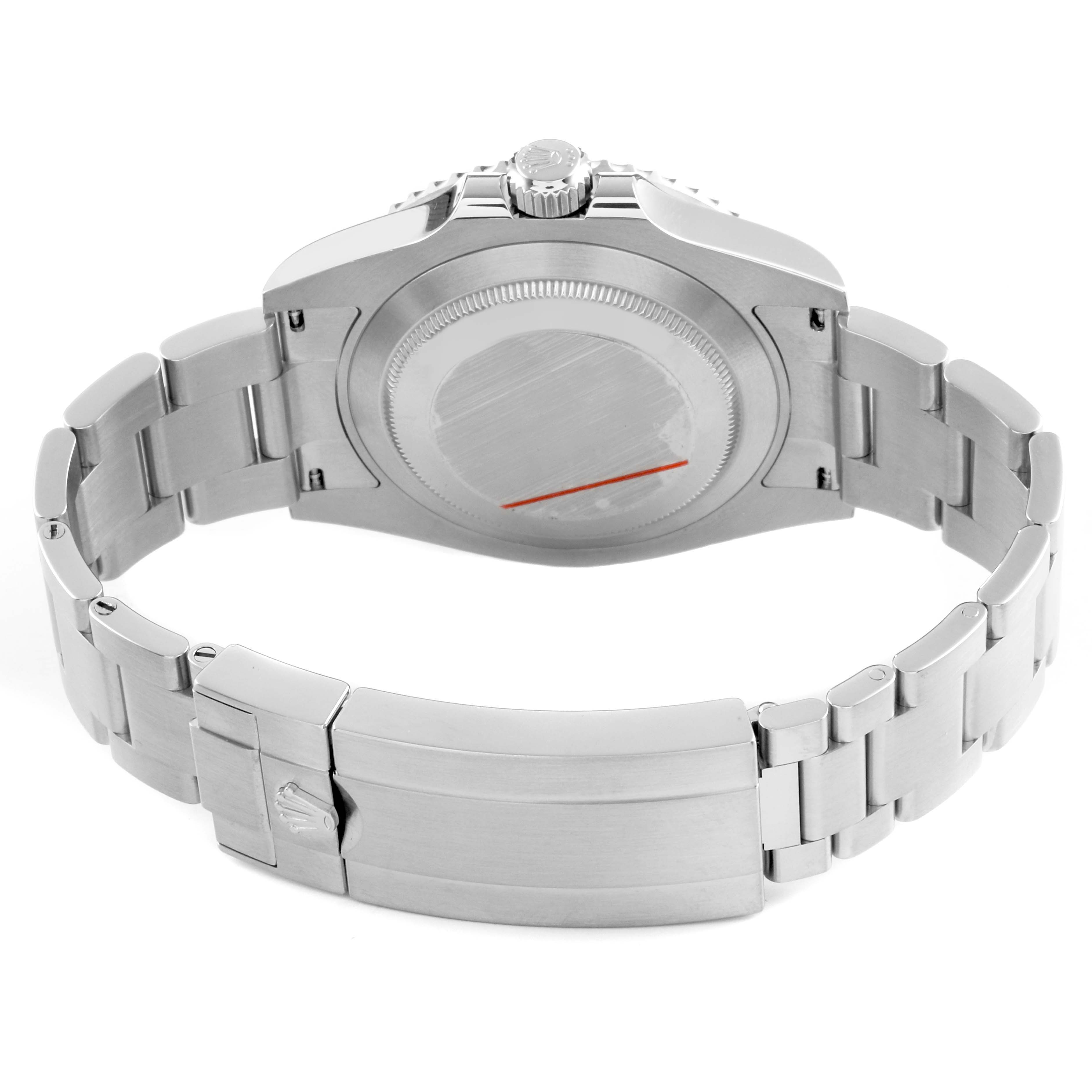 The image shows the back view of a Rolex Submariner 124060 Men's Stainless Steel Black Dial, highlighting the case back, bracelet, clasp, and crown.