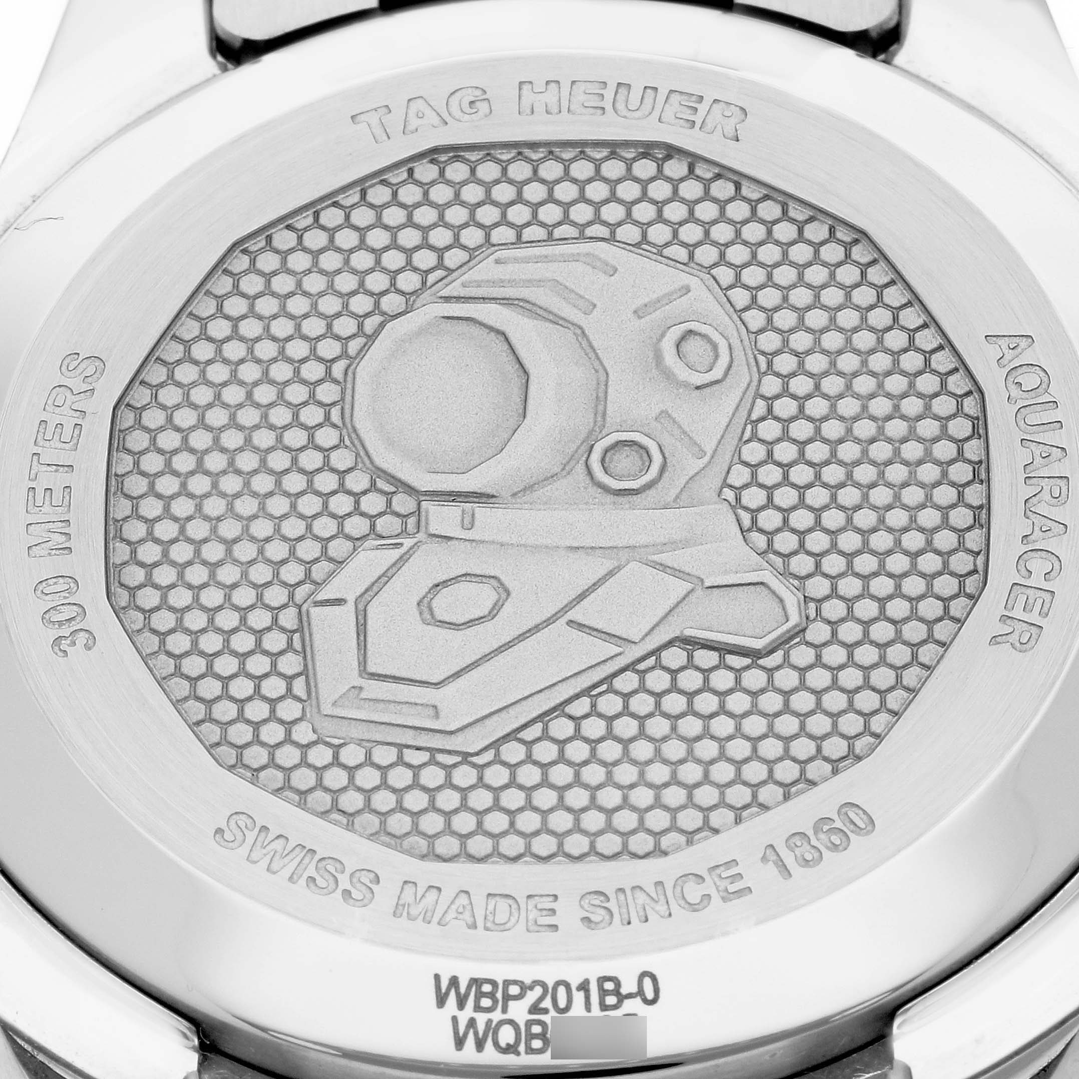 The image shows the back case of the Tag Heuer Aquaracer WBP201B.BA0632 Men's Stainless Steel Blue Dial WBP201B.BA0632 Men's Stainless Steel Blue Dial watch with branding and an engraved diving helmet design.