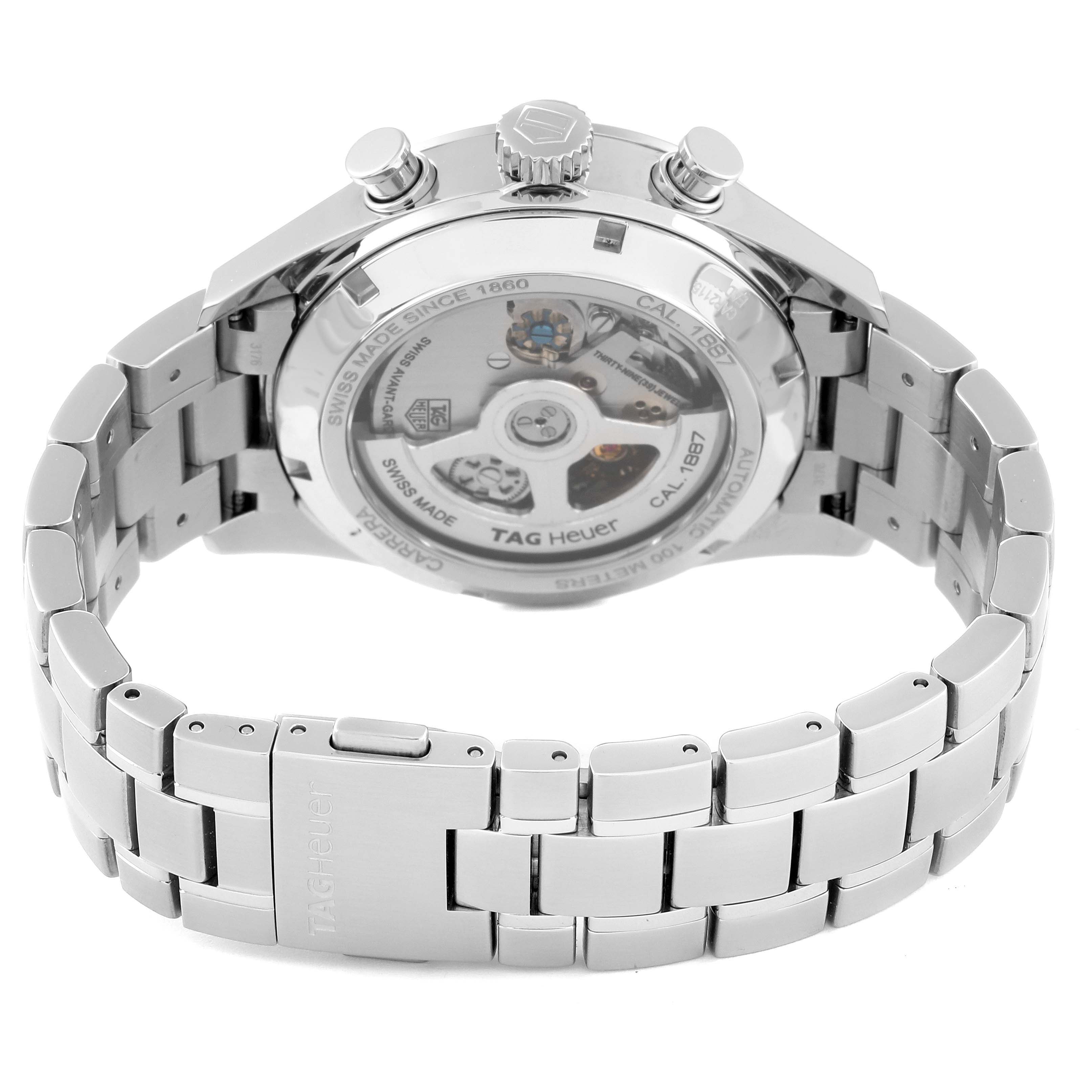 The image shows the rear view of a Tag Heuer Carrera CAR2115 Men's Stainless Steel Blue Dial CAR2115 Men's Stainless Steel Blue Dial watch, highlighting the transparent case back and the metal bracelet.