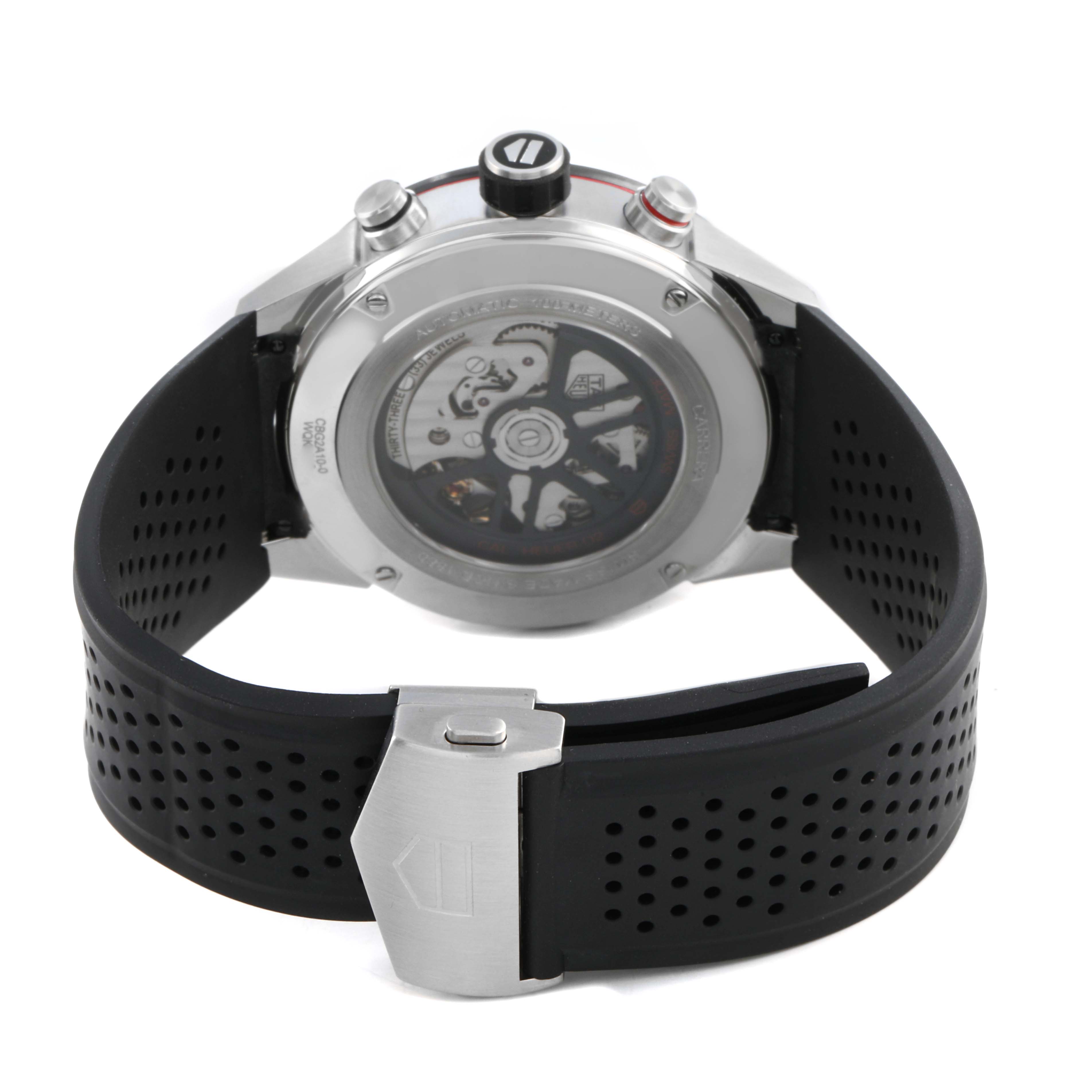 The Tag Heuer Carrera CBG2A10.FT6168 Men's Stainless Steel Black Dial watch is shown from the back, highlighting the transparent case back, strap, and clasp.