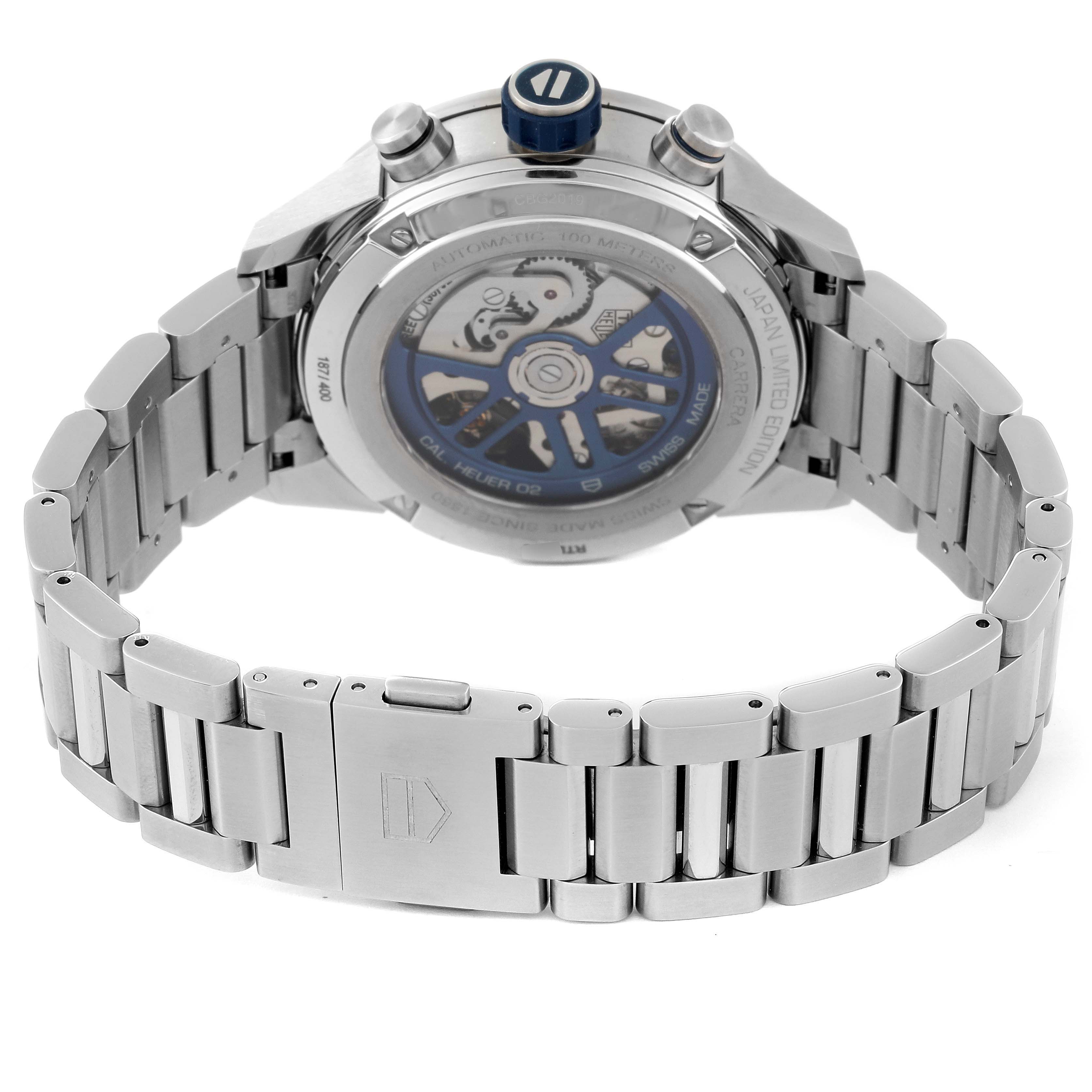 The image shows the back view of a Tag Heuer Limited Edition CBG2019.BA0662 Men's Stainless Steel Blue Dial CBG2019.BA0662 Men's Stainless Steel Blue Dial watch, highlighting its metal bracelet, clasp, and the transparent case back.
