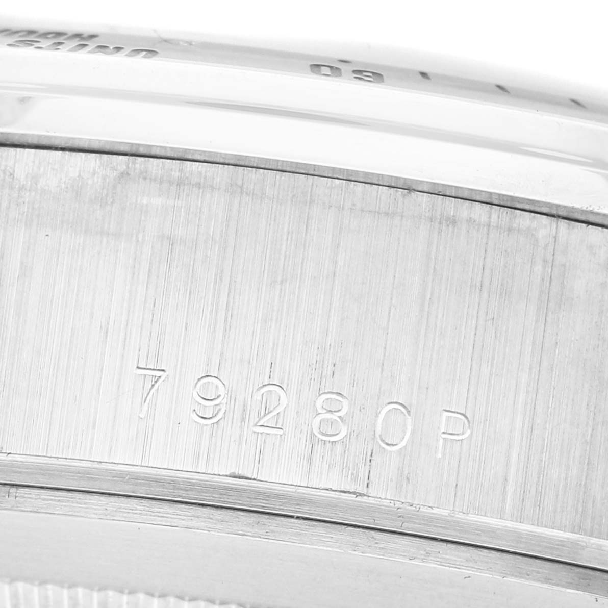 The image shows the side of the Tudor Prince T79280P50 Men's Stainless Steel White Dial model, focusing on the case with engraved numbers.