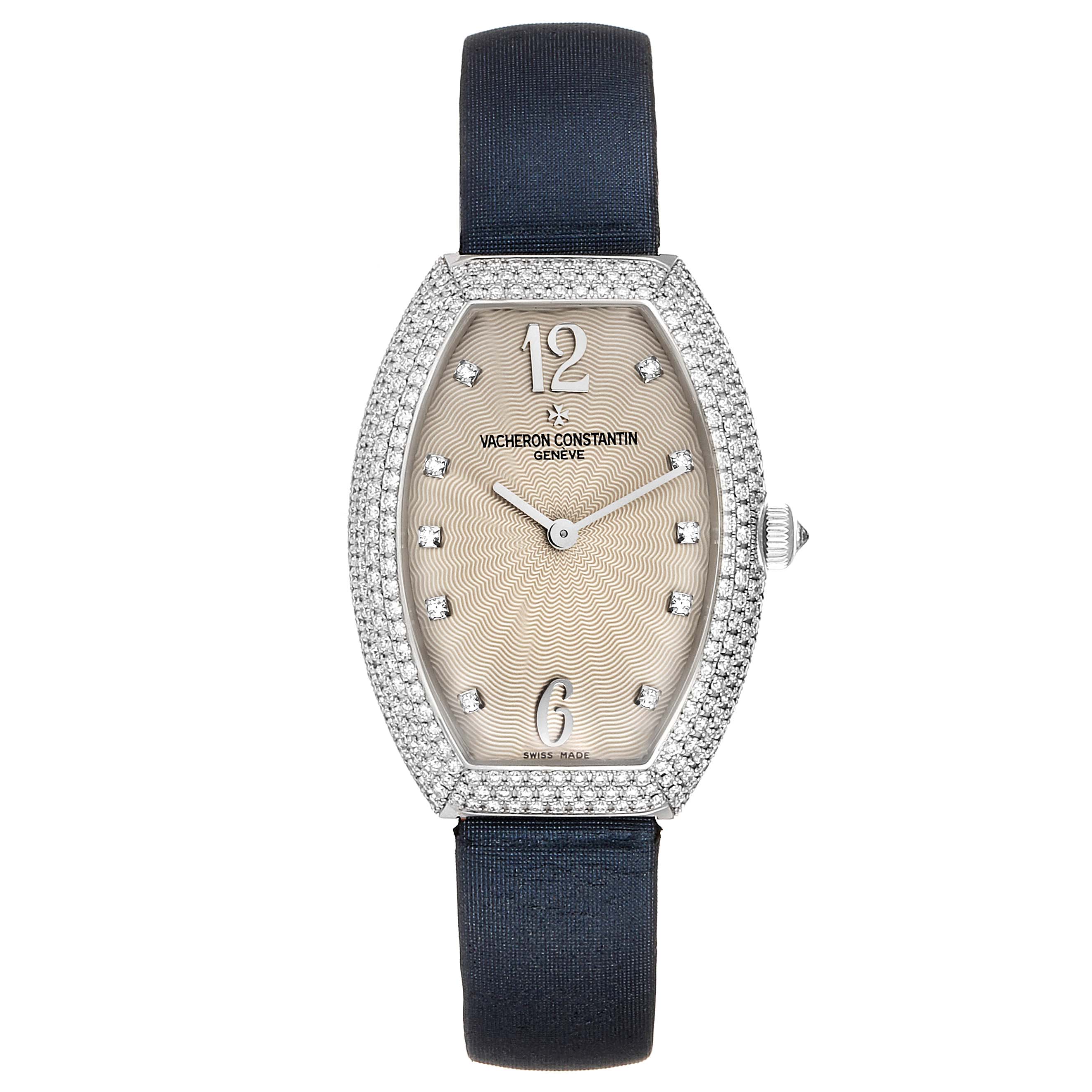 The image shows a Vacheron Constantin Egerie 25541 Women's White Gold Silver Dial 25541 Women's White Gold Silver Dial watch from a top view, featuring its face, strap, diamond-studded bezel, and crown.