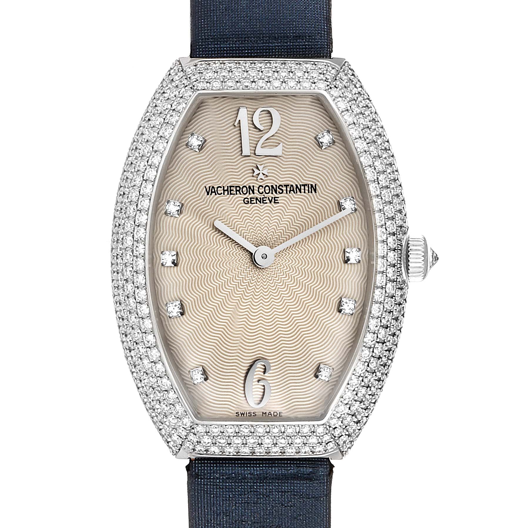 The Egerie model by Vacheron Constantin is shown from the front, displaying the dial, hands, crown, and diamond-encrusted bezel.
