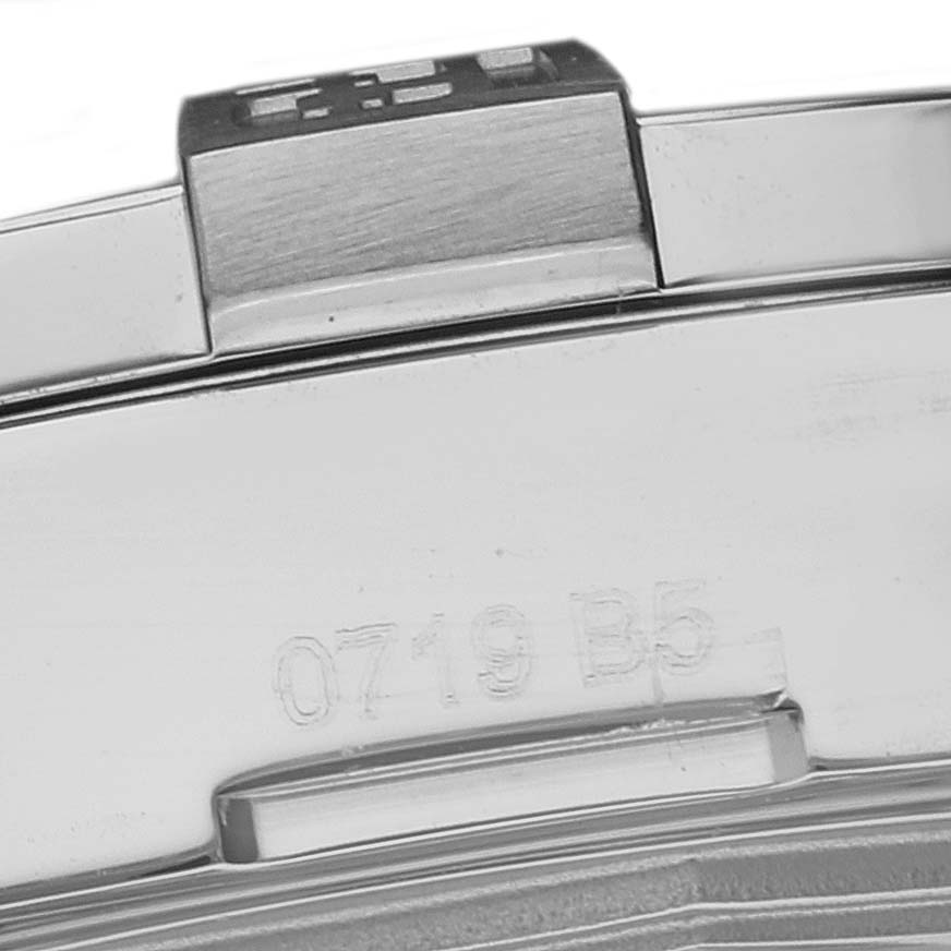 The image shows a close-up of the clasp and serial number of a Breitling Avenger A32390 Men's Stainless Steel Mother of Pearl Dial A32390 Men's Stainless Steel Mother of Pearl Dial watch.