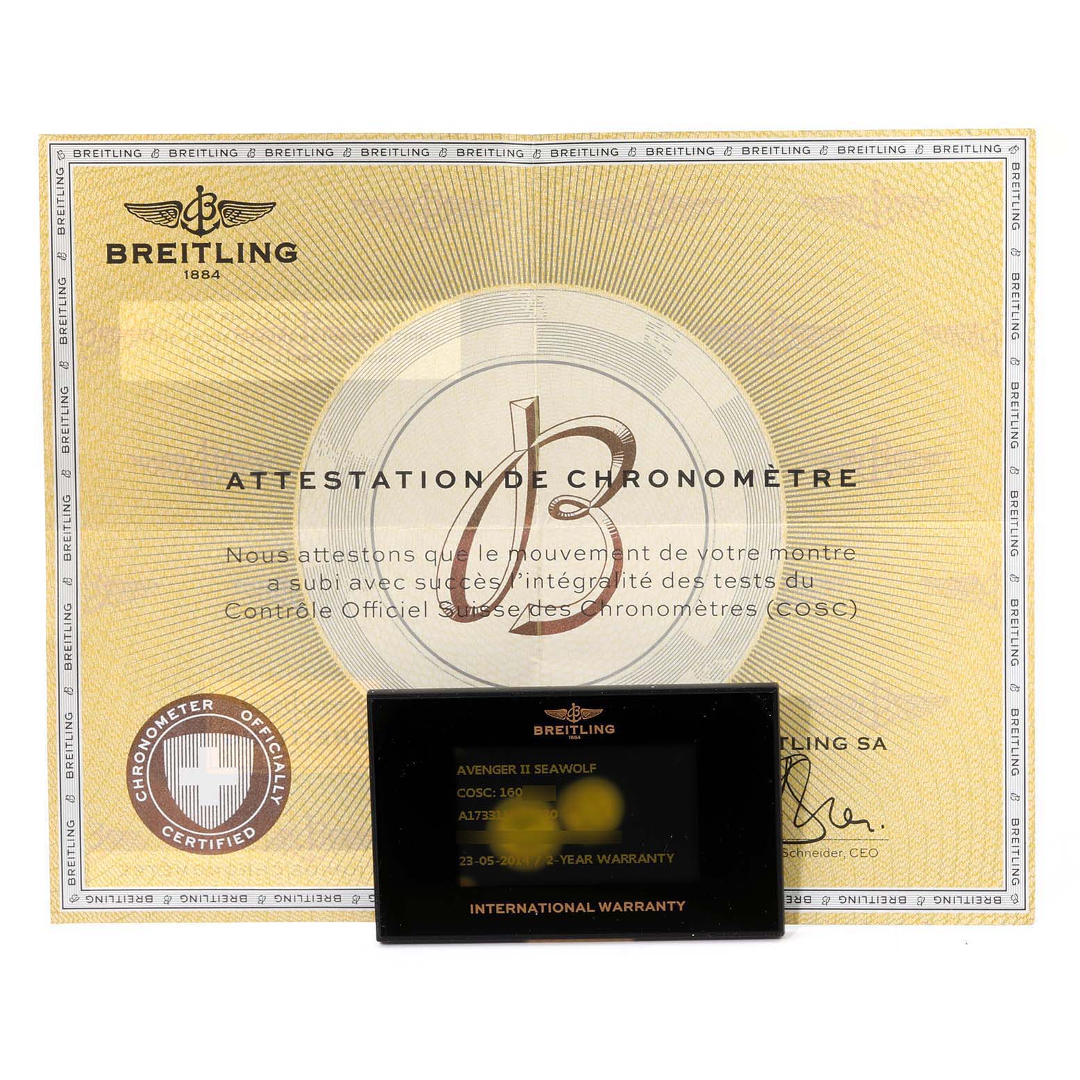 The image shows the Breitling Avenger A17331 Men's Stainless Steel Black Dial A17331 Men's Stainless Steel Black Dial model's Certificate of Chronometer and International Warranty card.