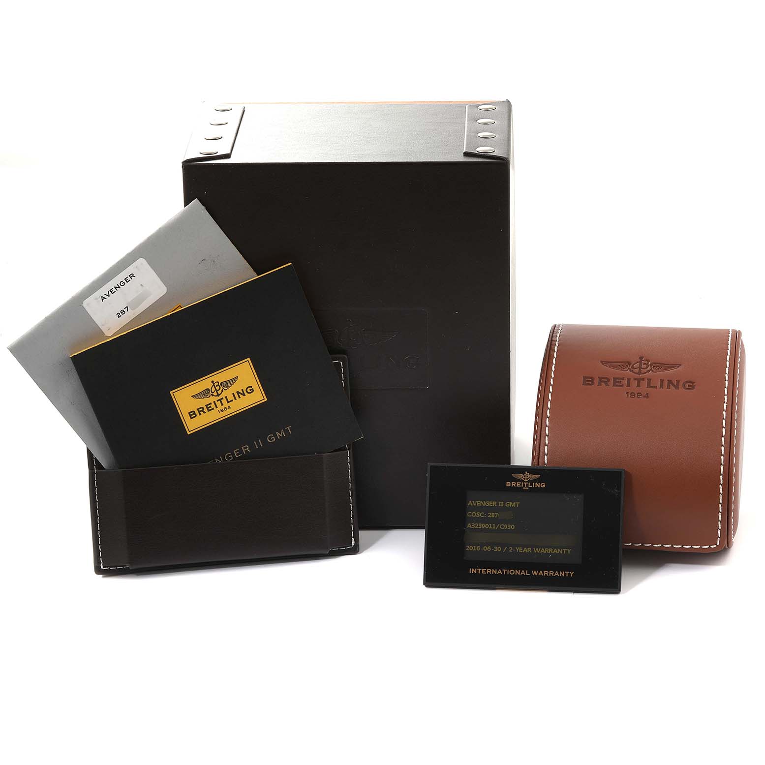 The image shows the packaging, warranty card, instruction manual, and leather travel case for the Breitling Avenger A3239011/C930 Men's Stainless Steel Mother of Pearl Dial A3239011/C930 Men's Stainless Steel Mother of Pearl Dial model.