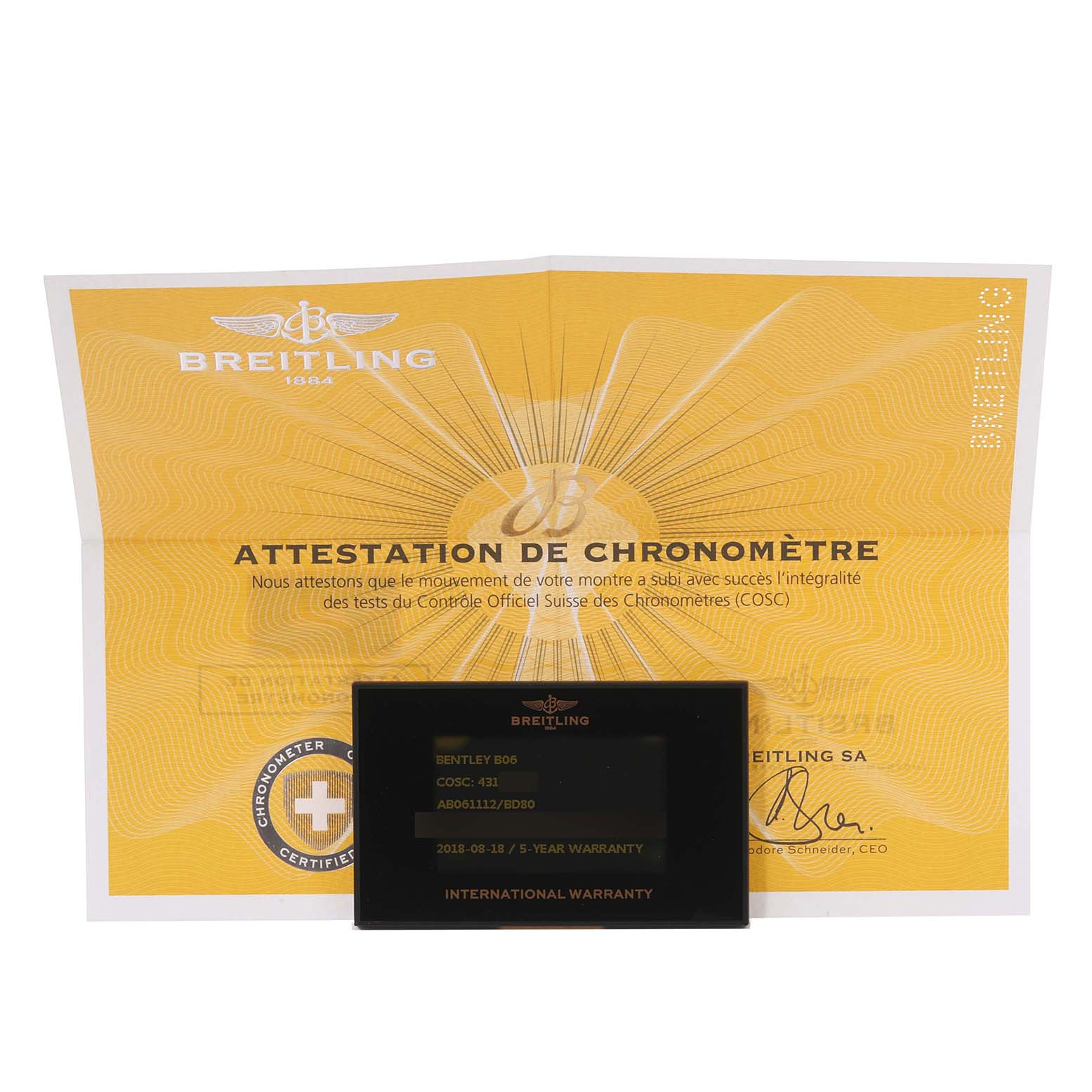 The image shows a Breitling Bentley AB061112/BD80 Men's Stainless Steel Black Dial AB061112/BD80 Men's Stainless Steel Black Dial model warranty card and a chronometer certification document.