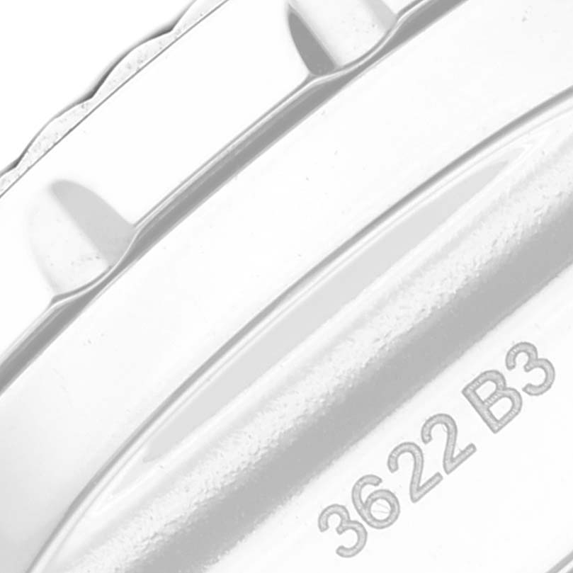 The image shows a close-up of the bezel and part of the case back of a Breitling Bentley AB061112/BD80 Men's Stainless Steel Black Dial AB061112/BD80 Men's Stainless Steel Black Dial model watch.